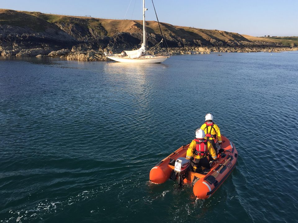 Tow line being taken over to the yacht
