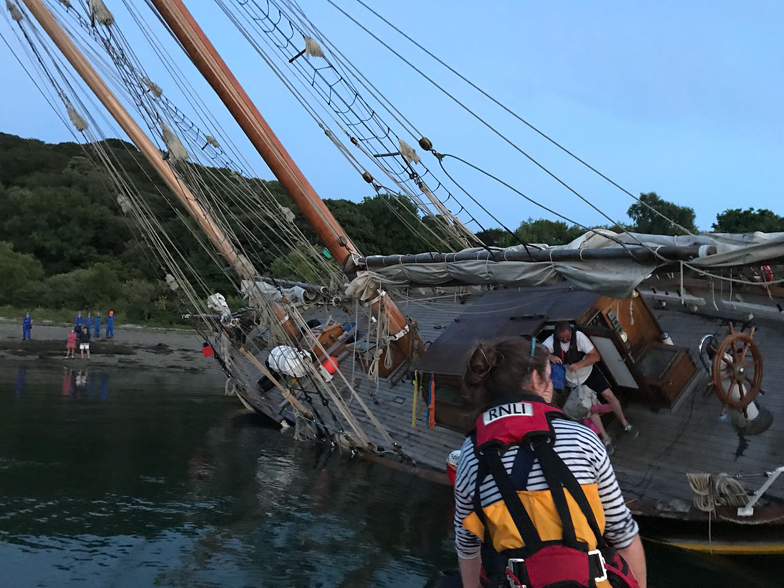 The schooner aground at Turnaware Point after suffering a mechanical failure