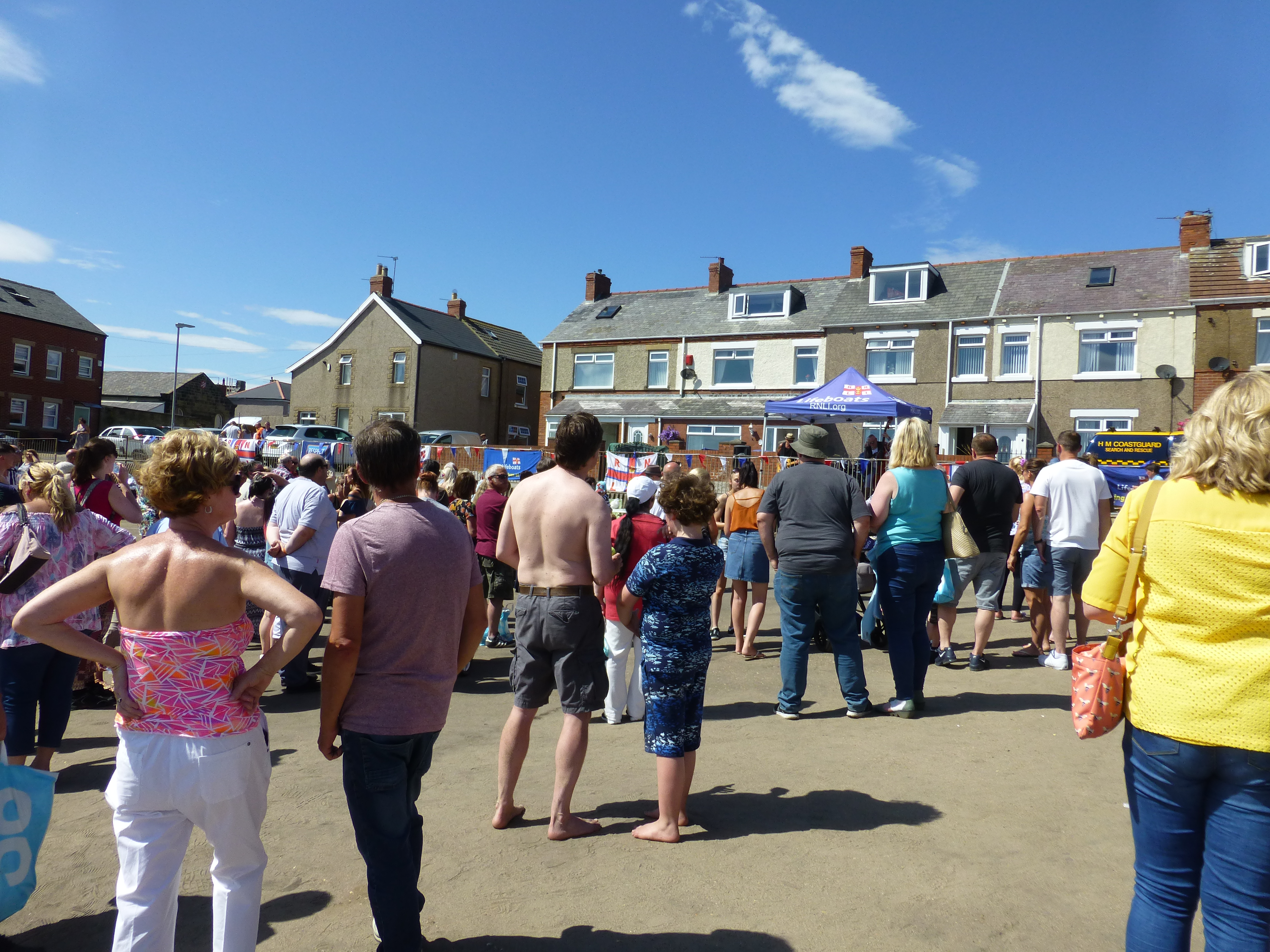 Crowds watch and dance with Percy and the Piglets who provided live music