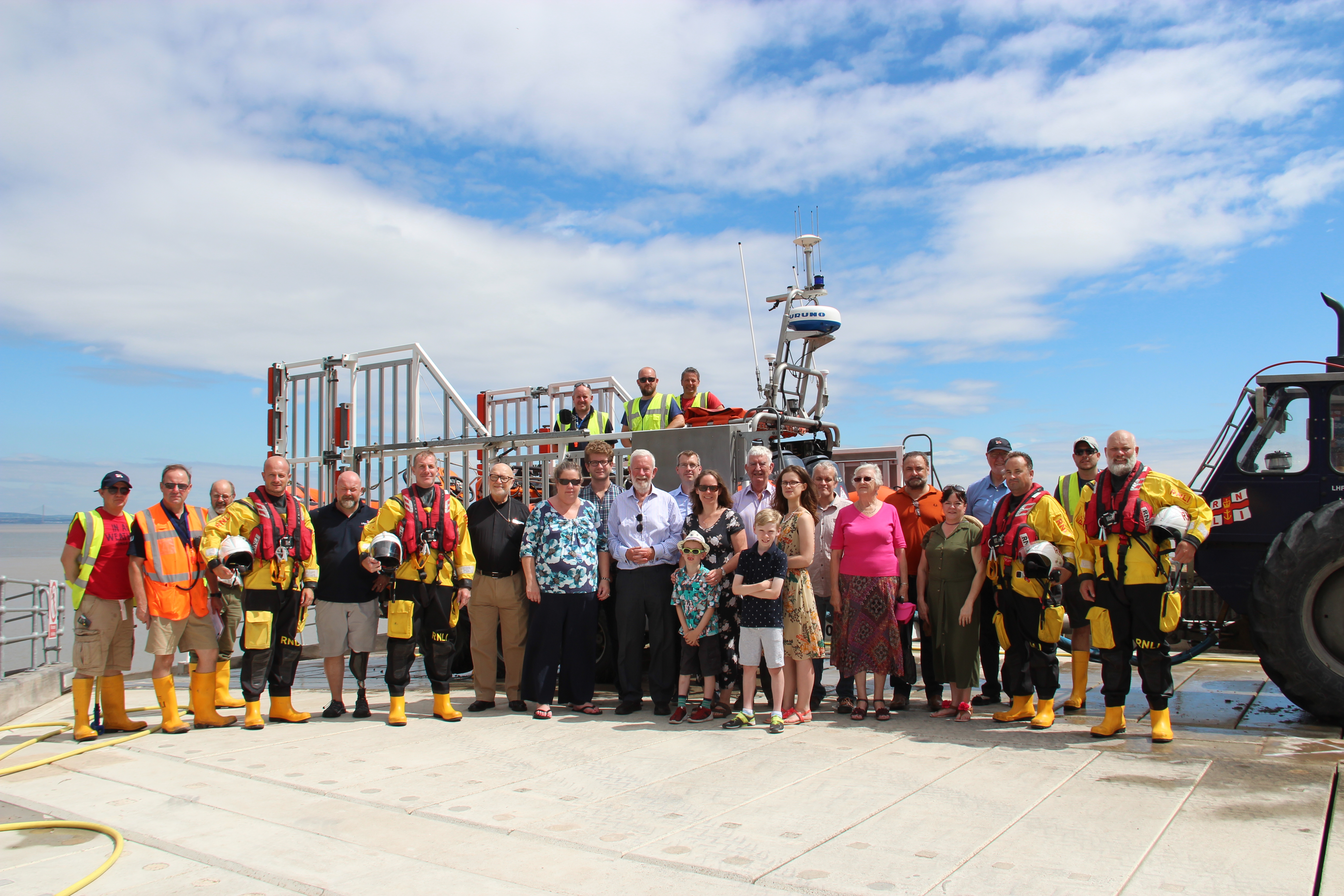 Paul Darling (centre) with his wider family among the RNLI volunteers at Portishead lifeboat station.
