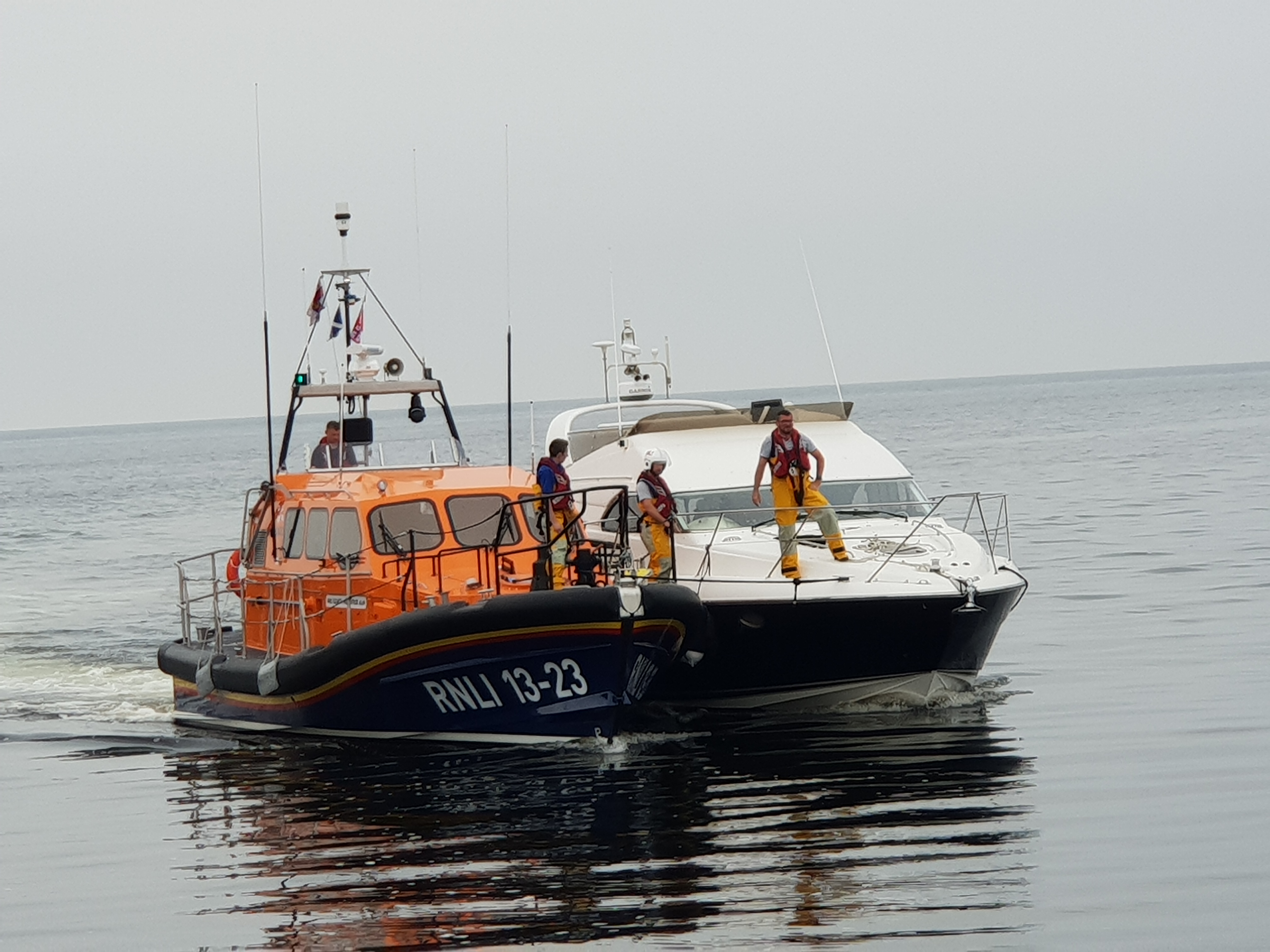 13-23 'Elizabeth and Gertrude Allan' bringing the casualty vessel into Girvan harbour