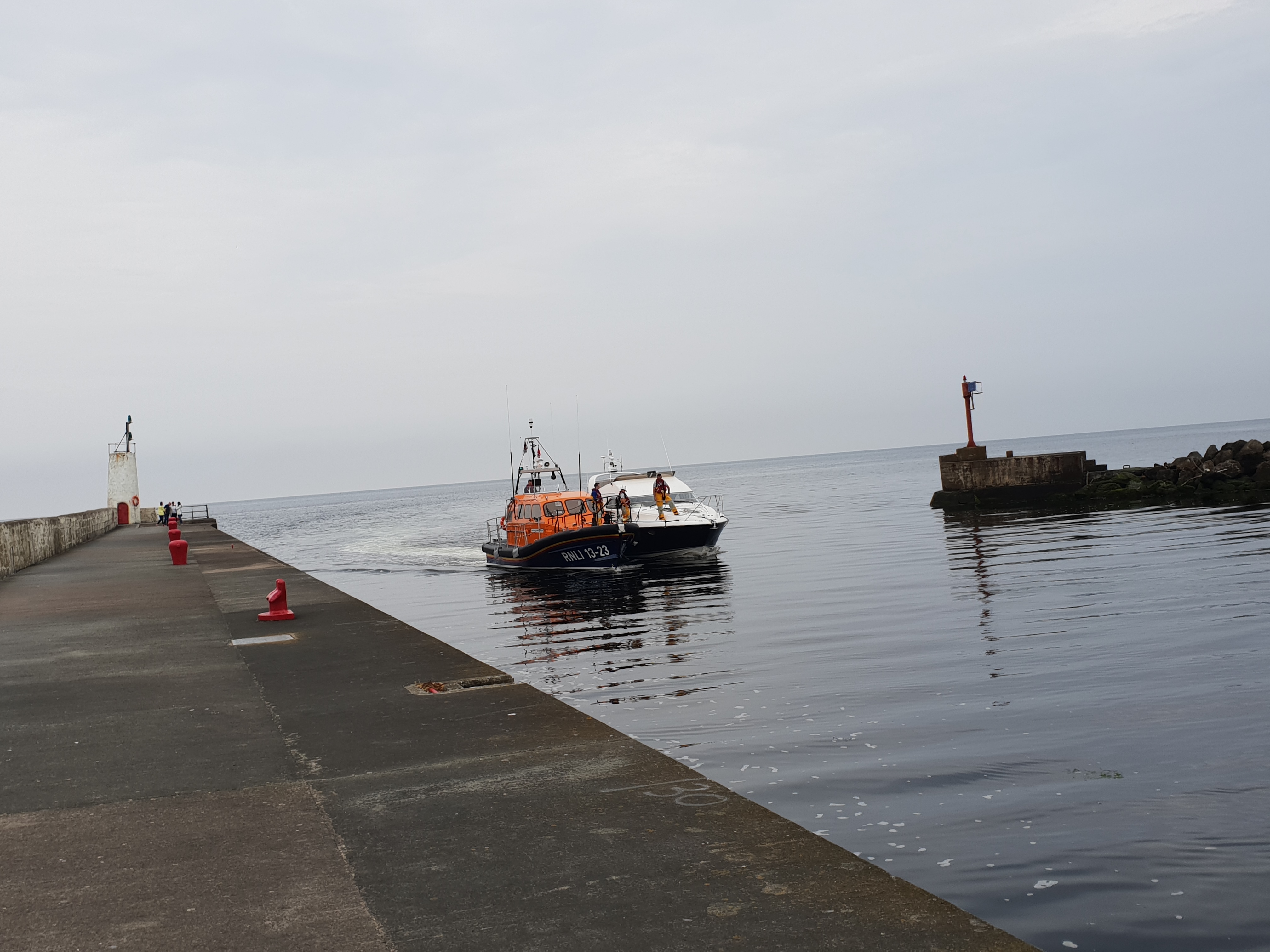 13-23 'Elizabeth and Gertrude Allan' bringing the casualty vessel into Girvan harbour