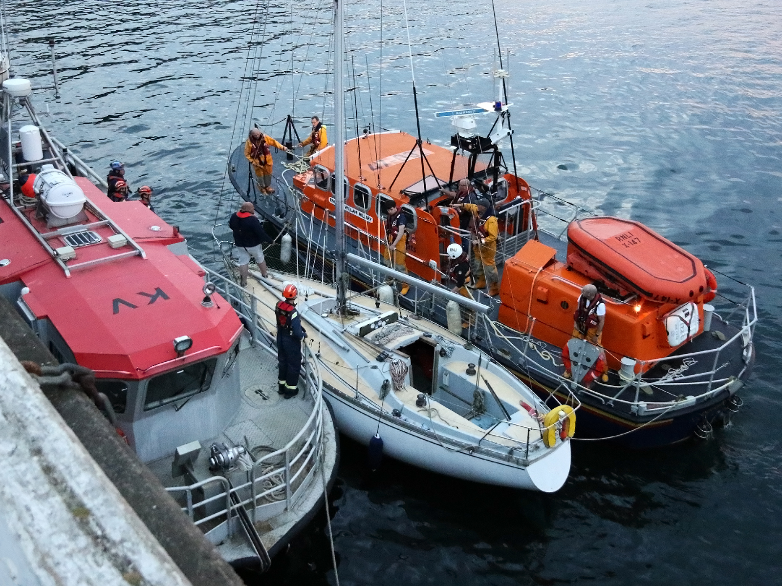 Douglas all-weather lifeboat Sir William Hillary with casualty vessel at the Battery Pier
