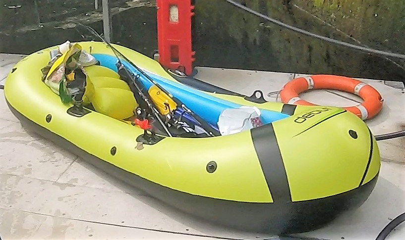A yellow inflatable dinghy containing fishing equipment that was found by the yacht recovered to the pontoon at Ardrossan