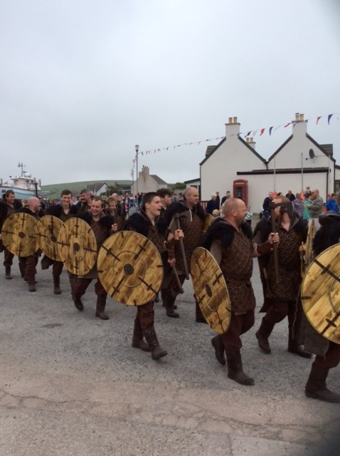Delting Up Helly Aa squad members during the parade