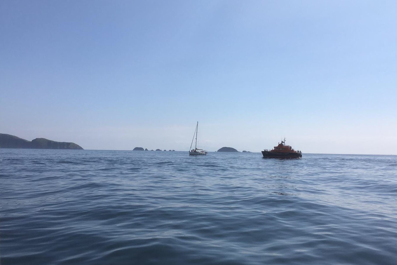 Casualty vessel and Stornoway RNLI Lifeboat