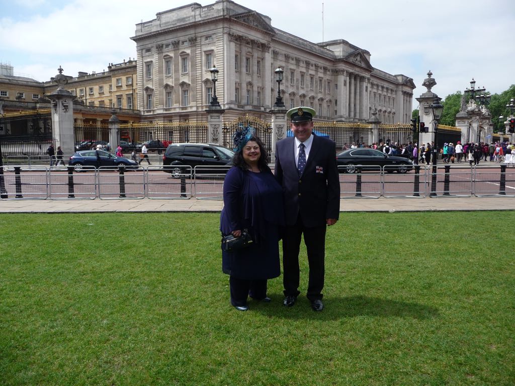 Becky and John Reason pictured together outside Buckingham Palace