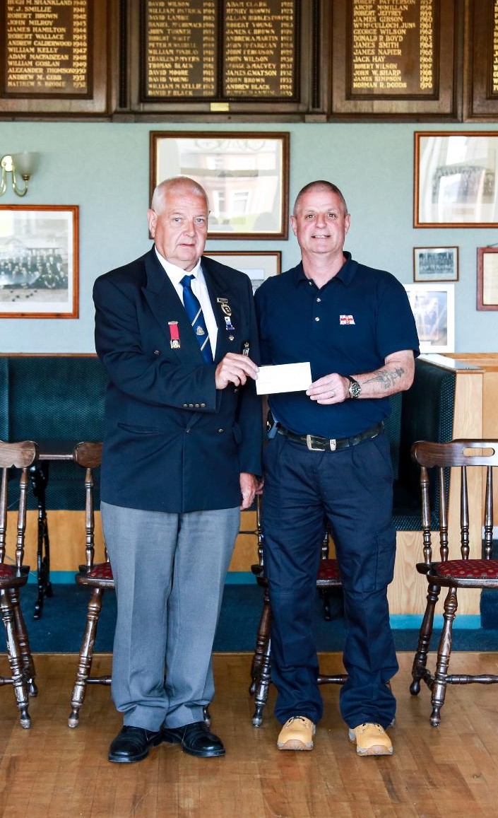 Pictured at the handover are Club President Robert Roddie and Troon Lifeboat Coxswain Joe Millar.