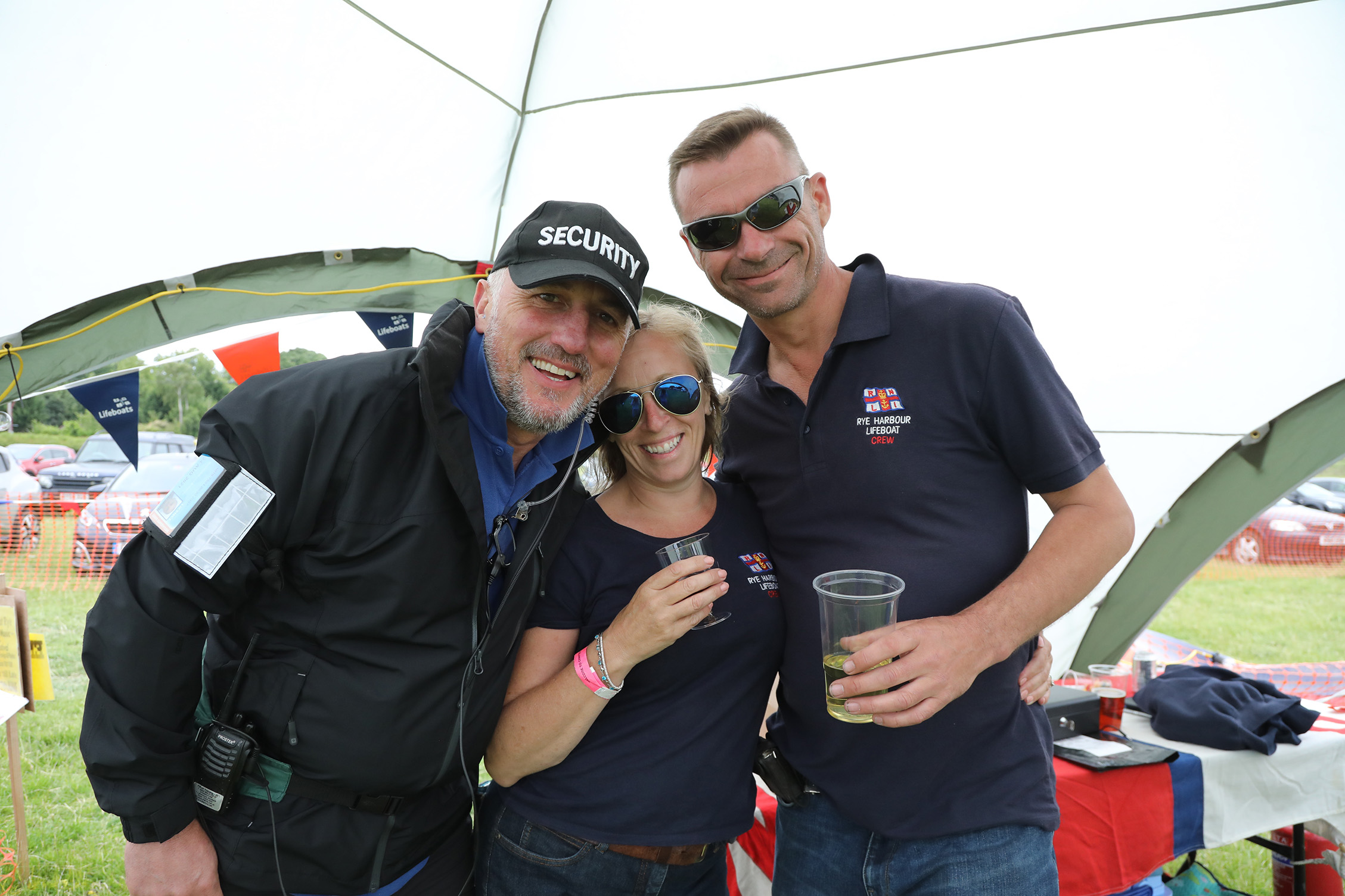 security guard and two RNLI crew members