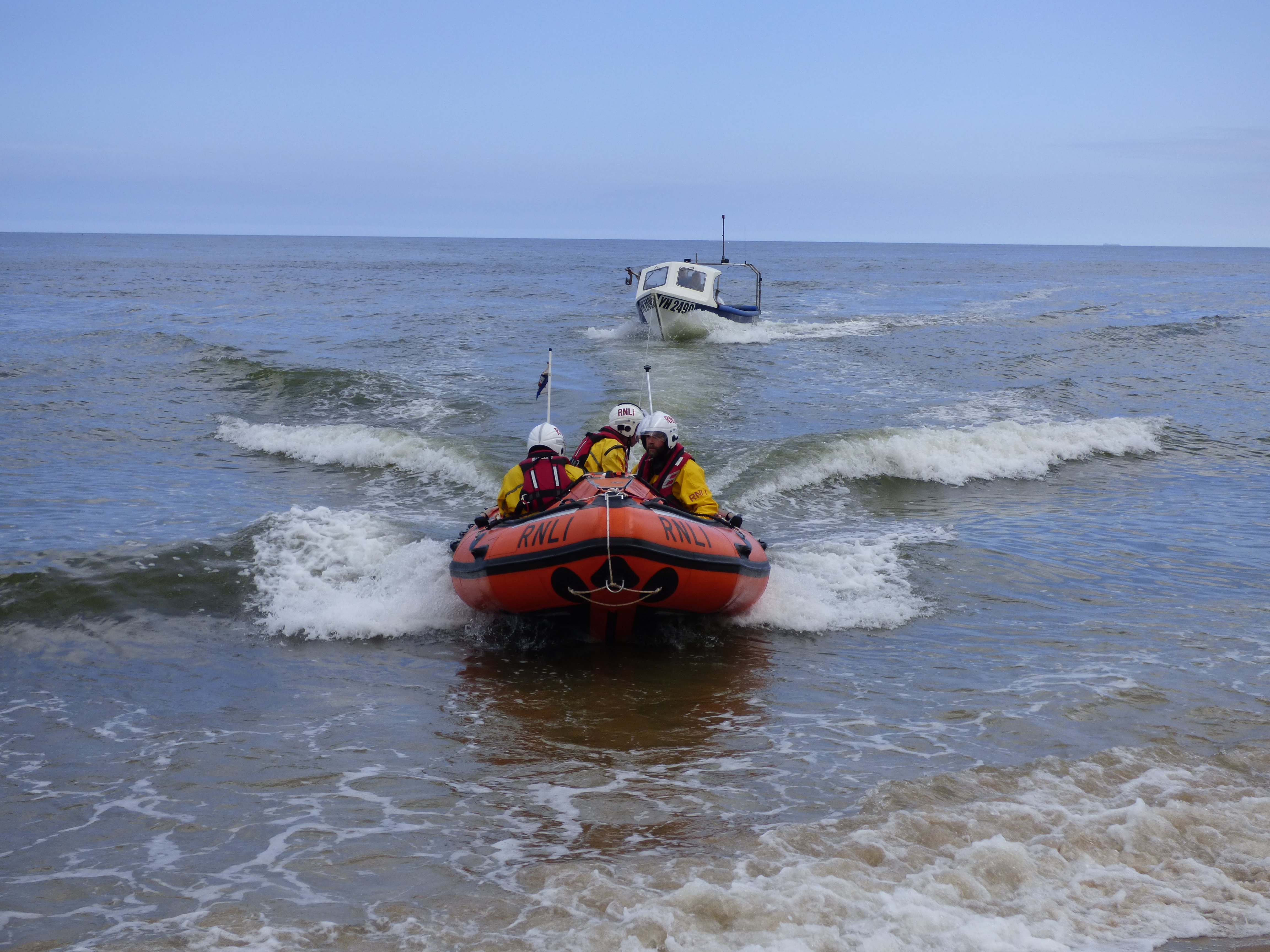 ILB towing crab fishing boat to shore