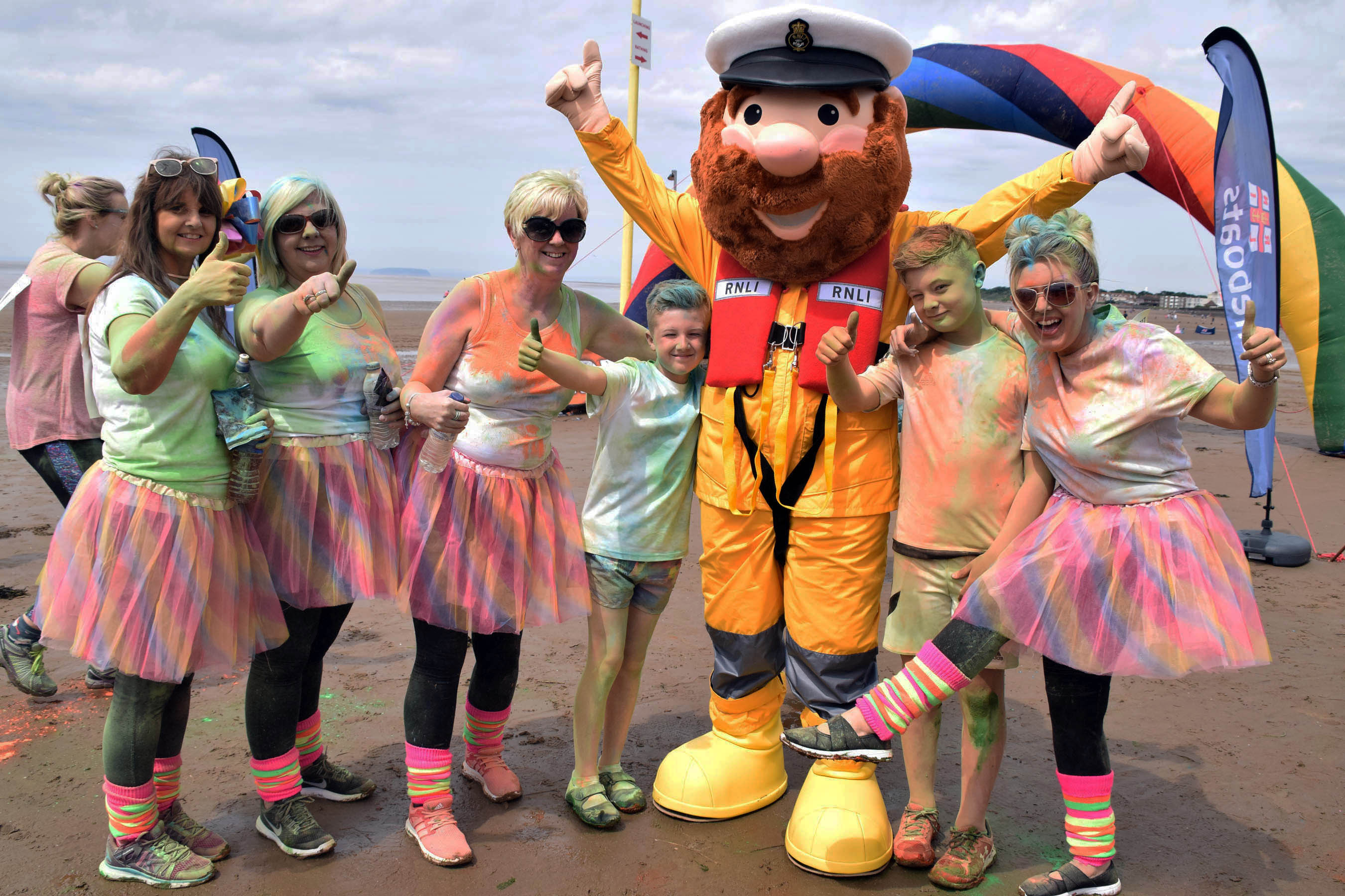 Stormy Stan greets finishing participants in the rainbow race