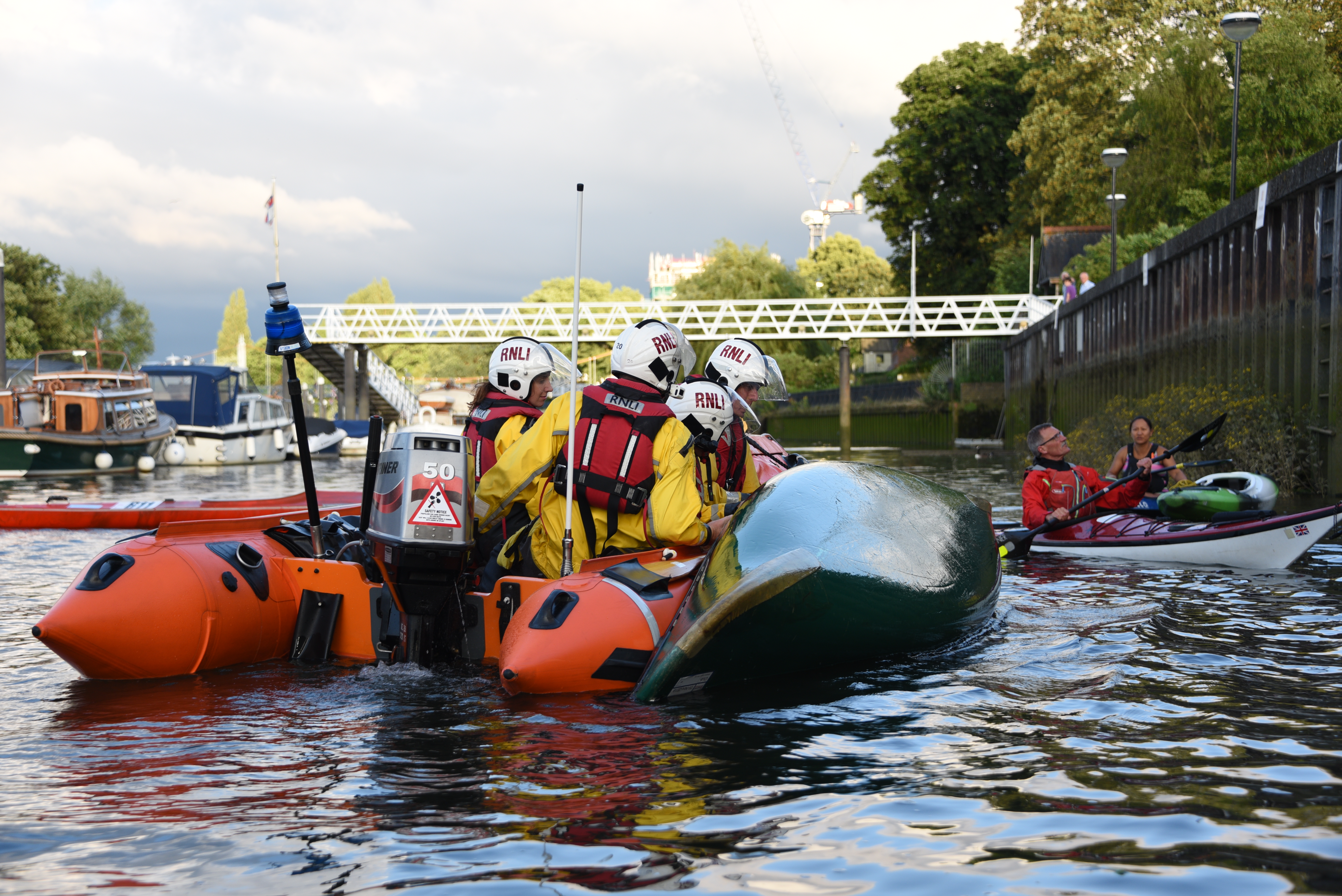 Andrew Wallace (In Red) of Hampton Canoe Club Instructs Teddington RNLI
