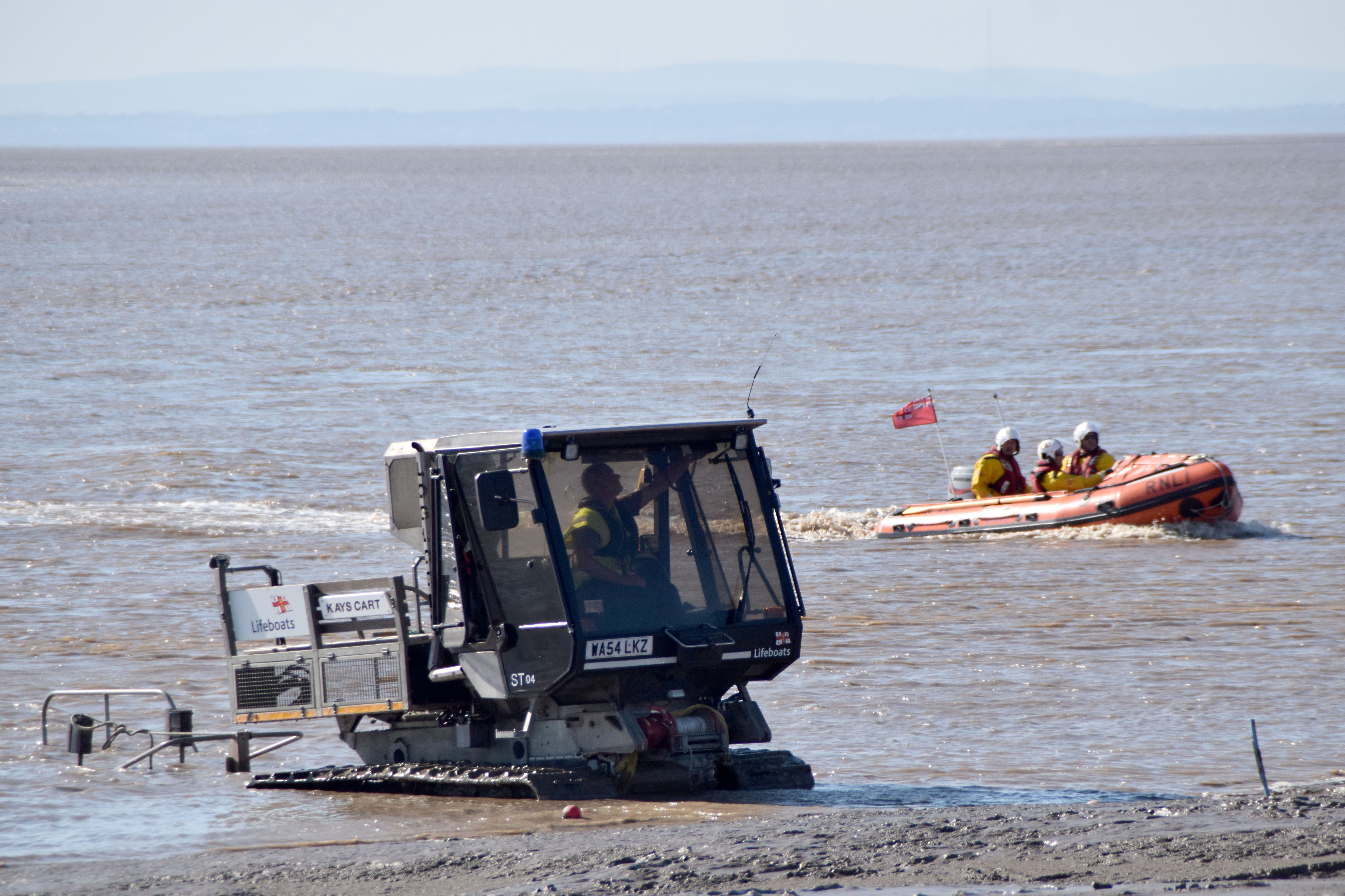 D class lifeboat Burnham Reach approaching the launching tractor Kays Cart before recovery