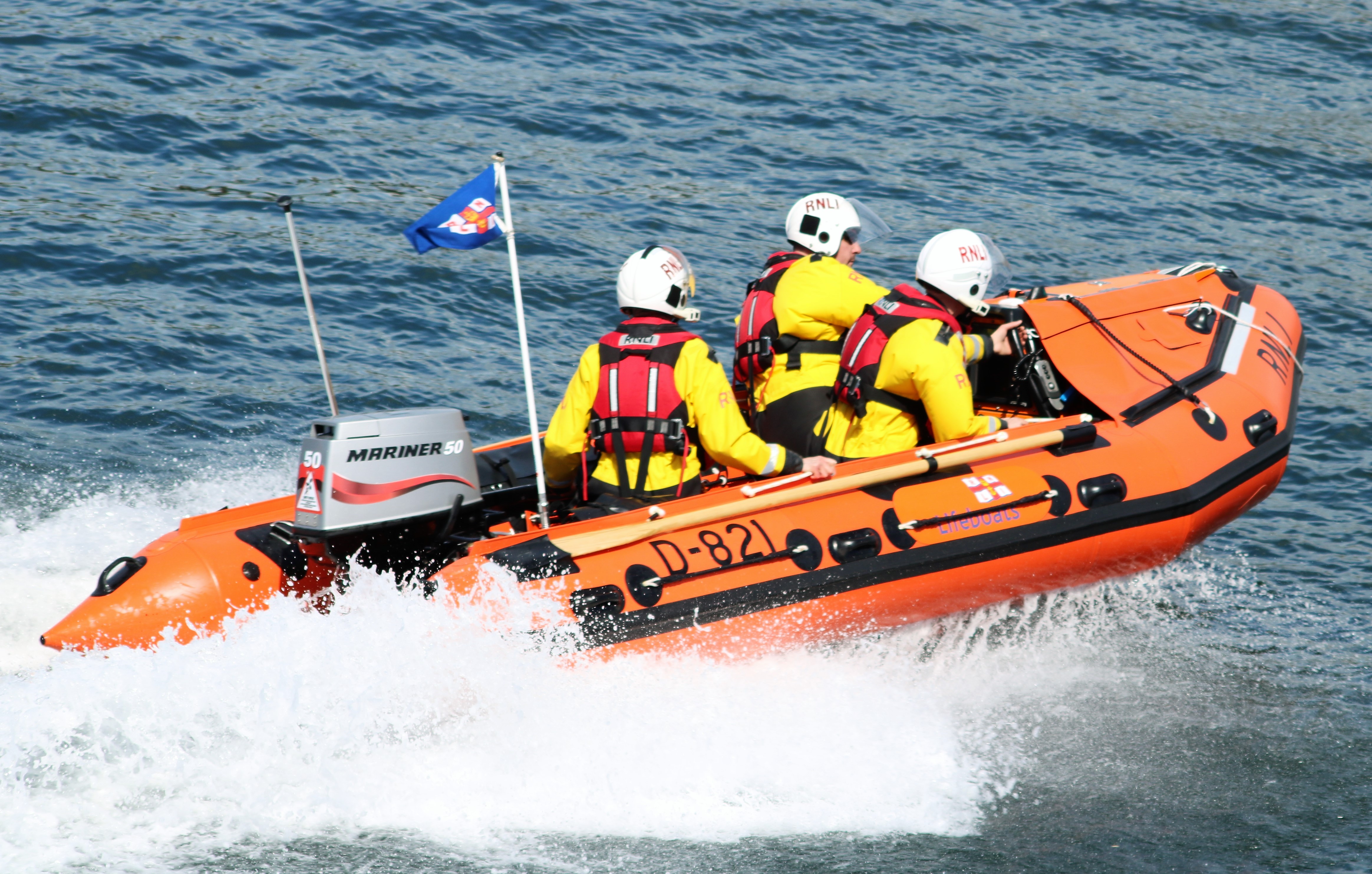 Troon D class inshore lifeboat 'Sheena' with three crew on board making 