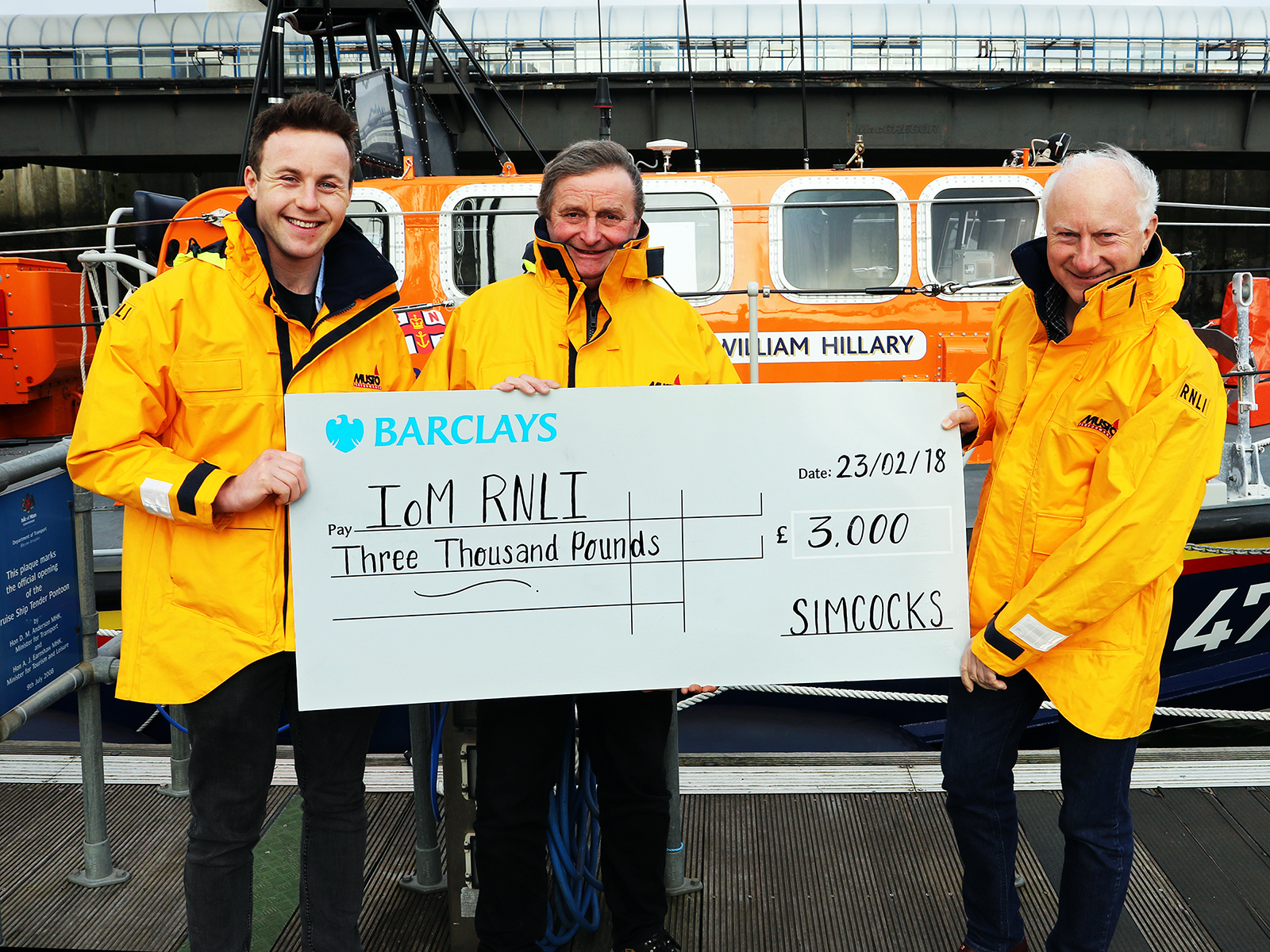 Cheque presentation L-R: Mr Samuel Games(Simcocks), Mr Tony Radcliffe(RNLI) and Mr Phil Games(Simcocks)
