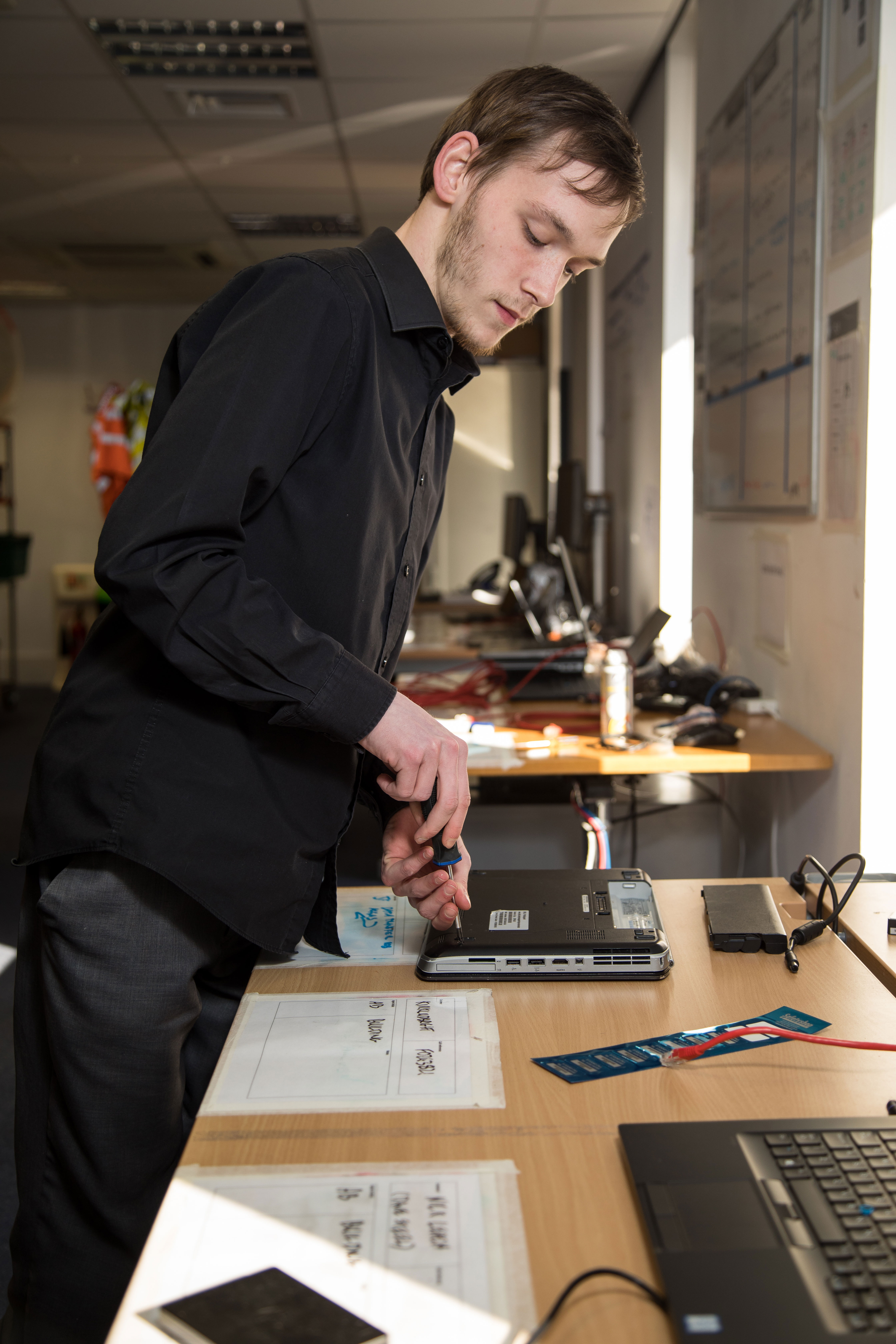 IT apprentice Joe at work
