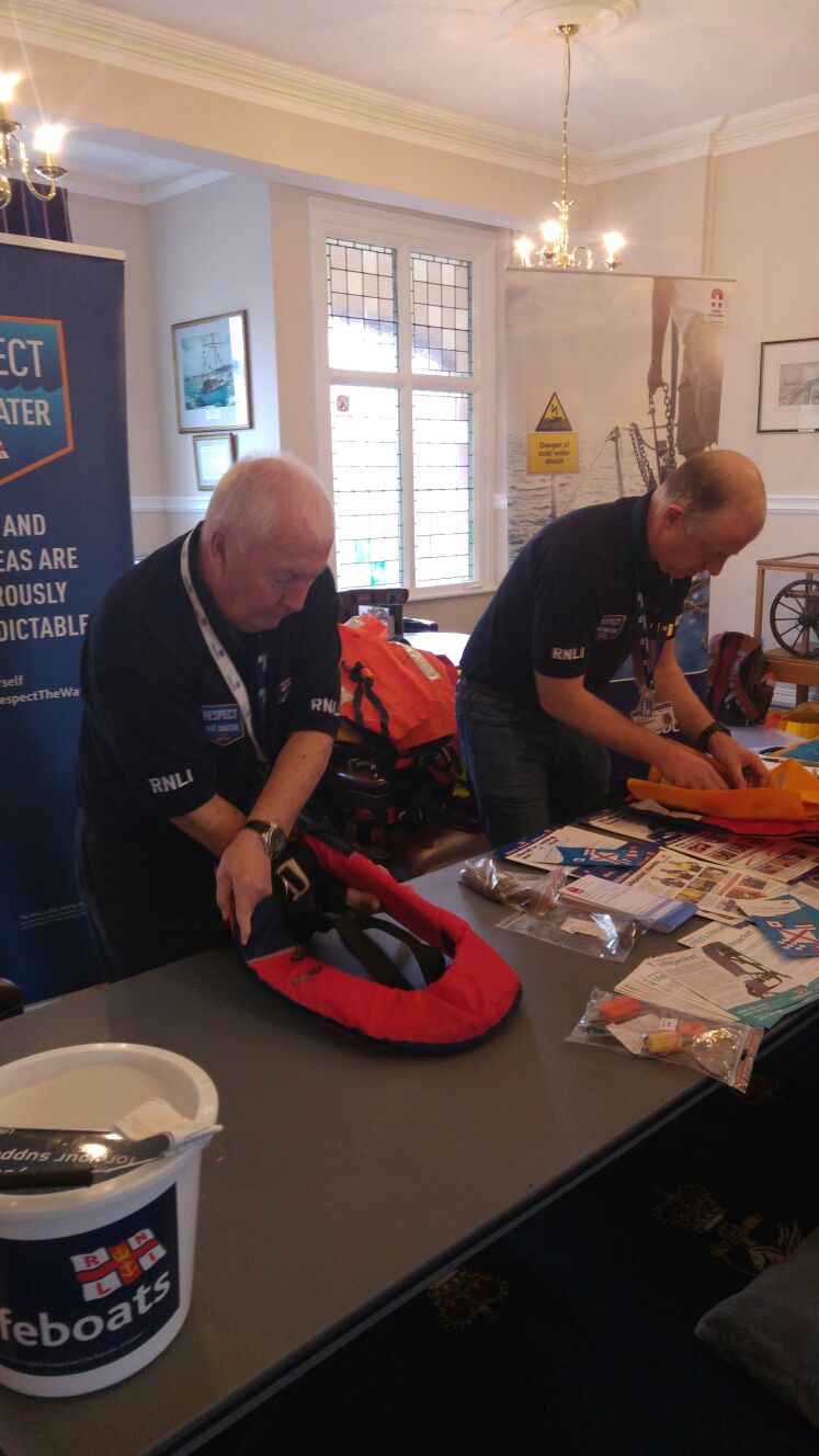 Picture showing life-jackets being checked