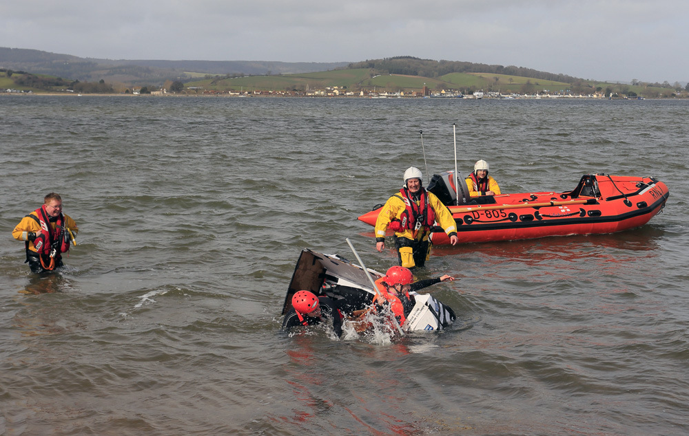 Students capsized after the cardboard boat collapsed 