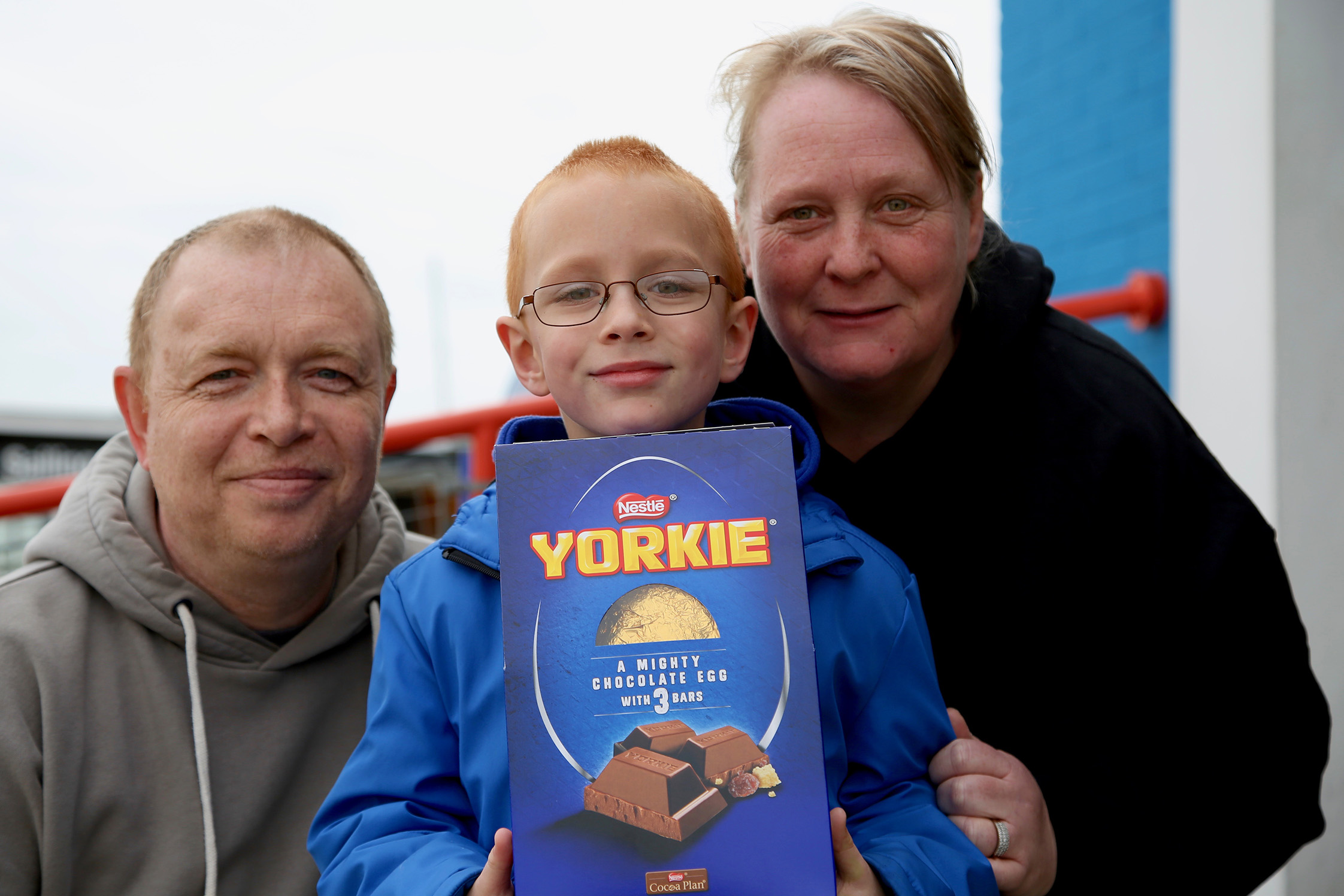 Jacob, winner of the Easter egg hunt, with proud parents