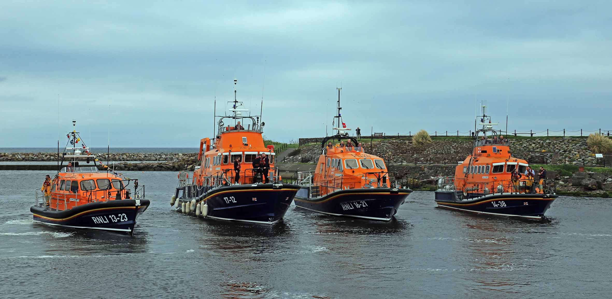 all 4 25knot capable all-weather lifeboats lined up, Girvans new Shannone, flanked by Barra's Severn Class, Portpatrick's Tamar Class and Troons Trent Class all-weather lifeboats