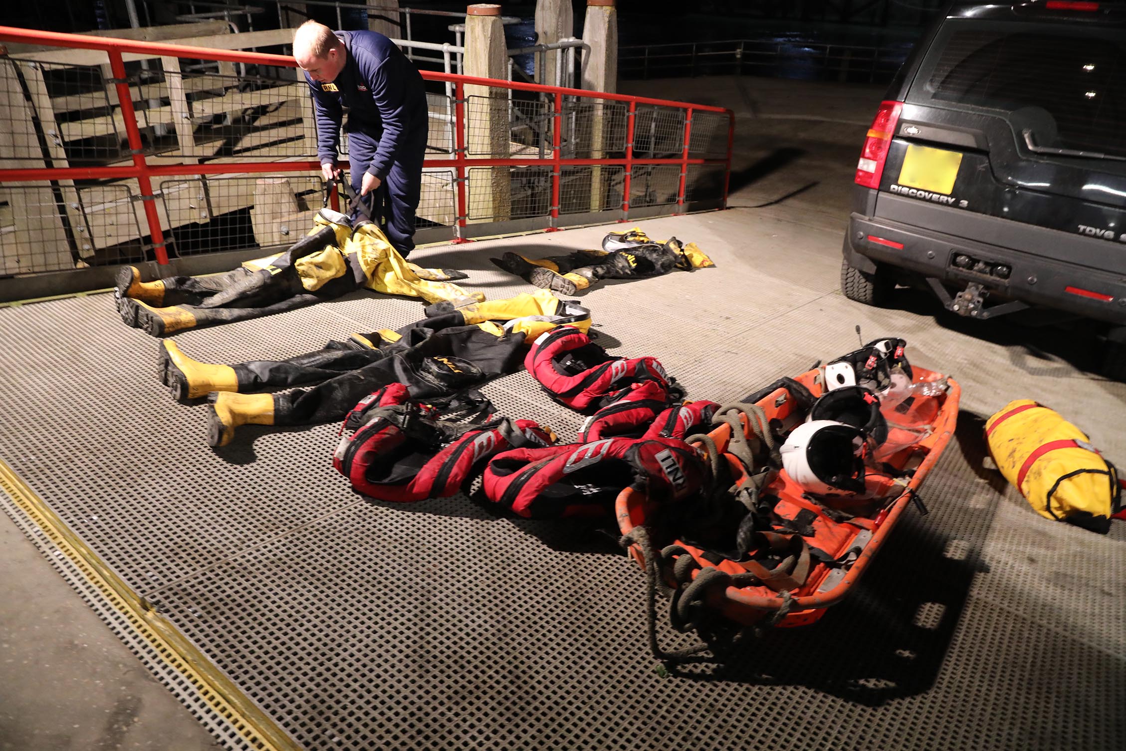 crew member with kit laid out ready to be cleaned