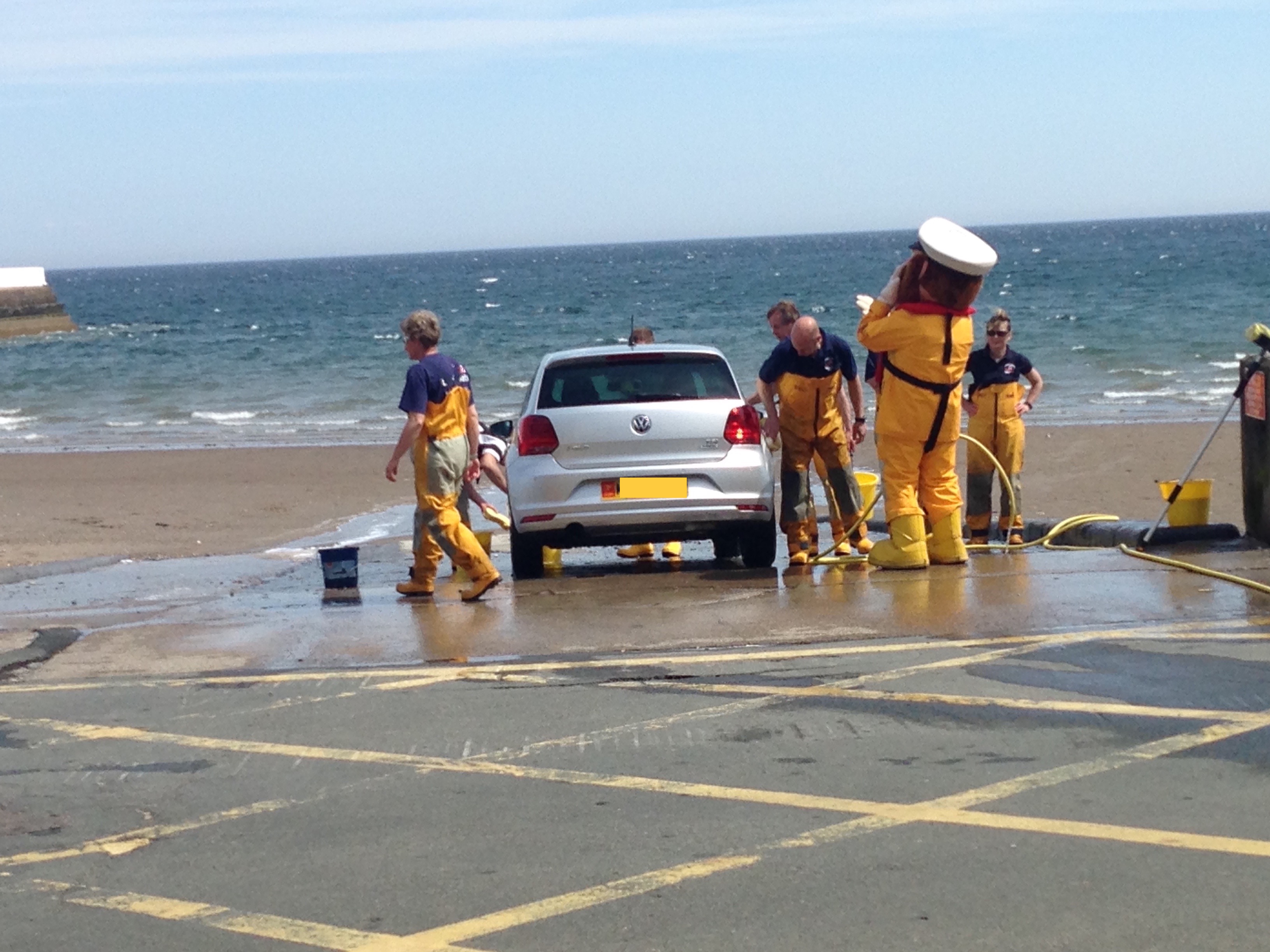 Stormy Stan giving helpful car washing advice to Ramsey volunteer crew 