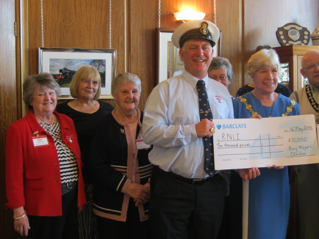 The photograph shows Bury Mayor, Dorothy Gunther, presenting the cheque to Tony Cowell, accompanied by Bury Ladies Lifeboat Guild.