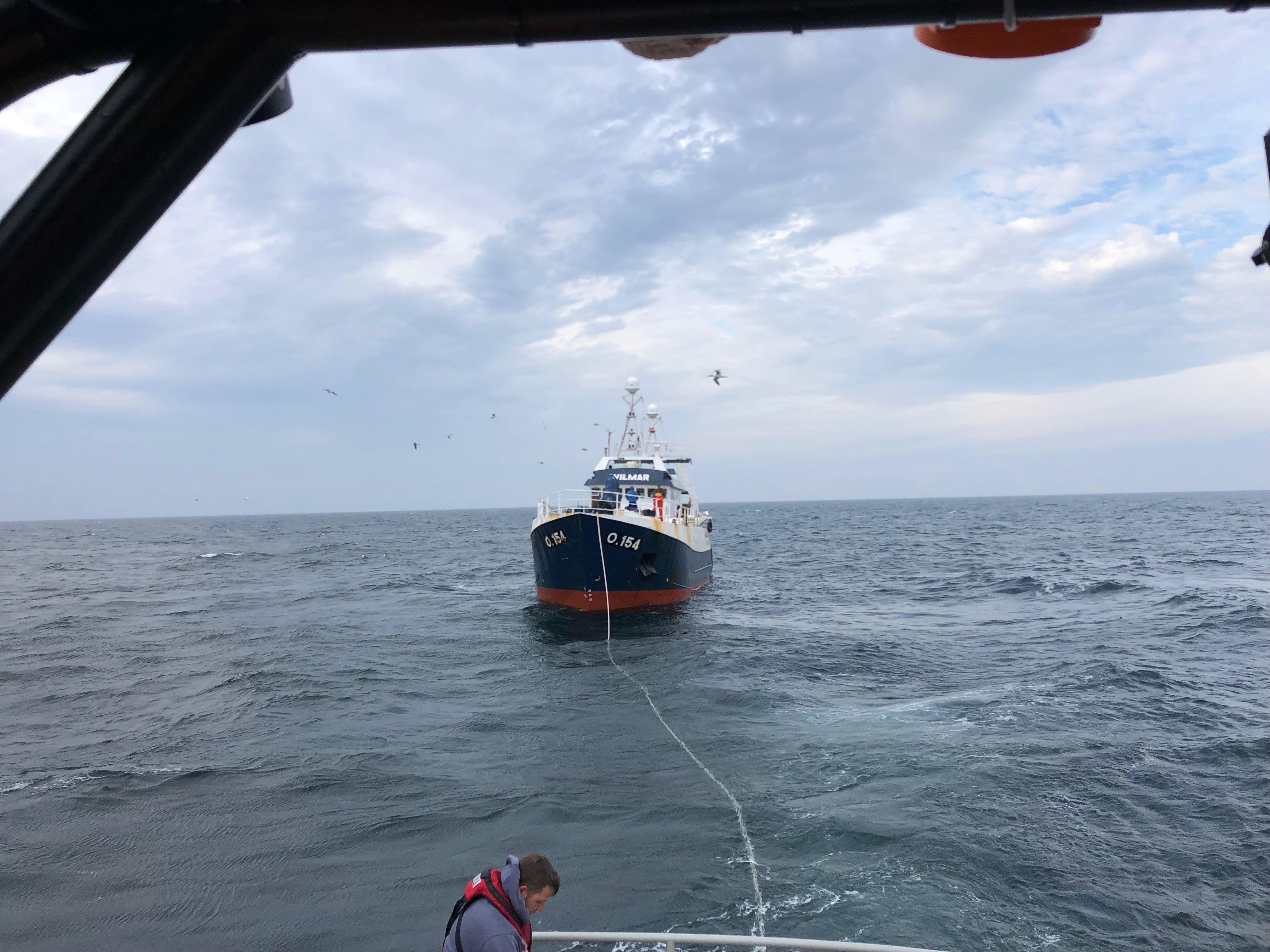 The fishing vessel under tow to Milford by Angle RNLI’s all weather Tamar class lifeboat Mark Mason.