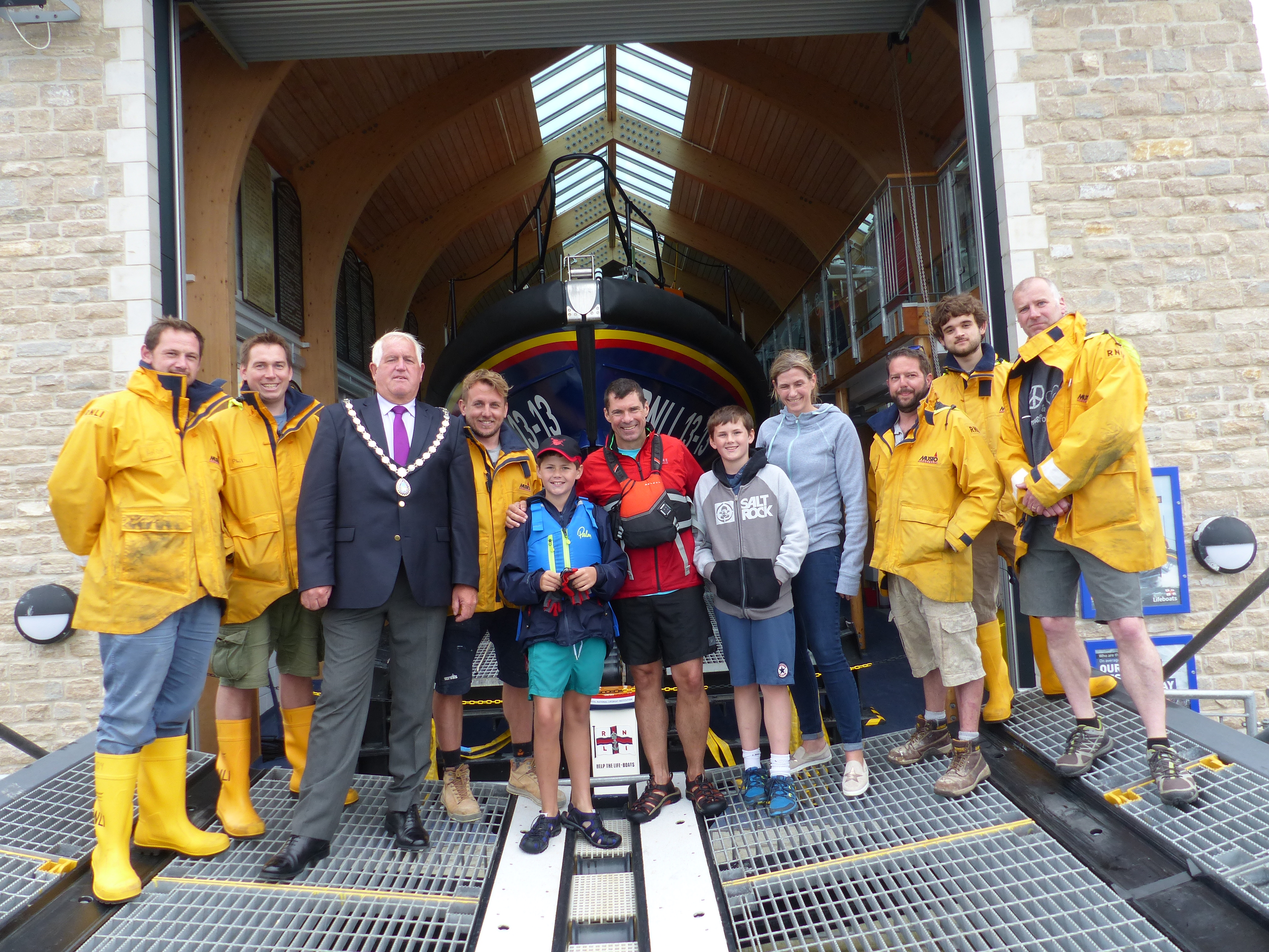 Sam and his father arrive at Swanage Lifeboat Station having cycled from Marlow to Warham and kayaked from Wareham to Swanage