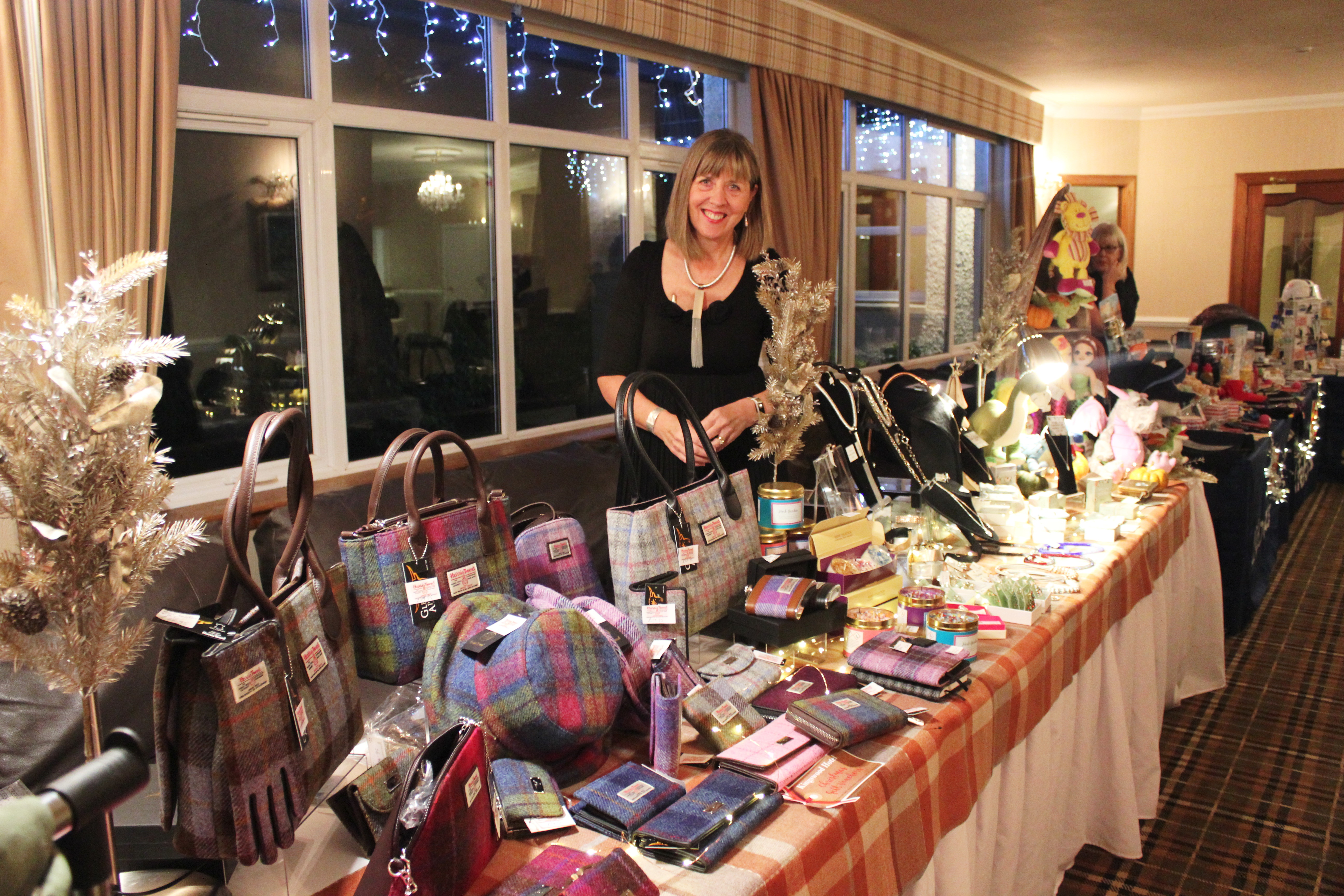 Kingswood's Kathryn Bell behind their stall