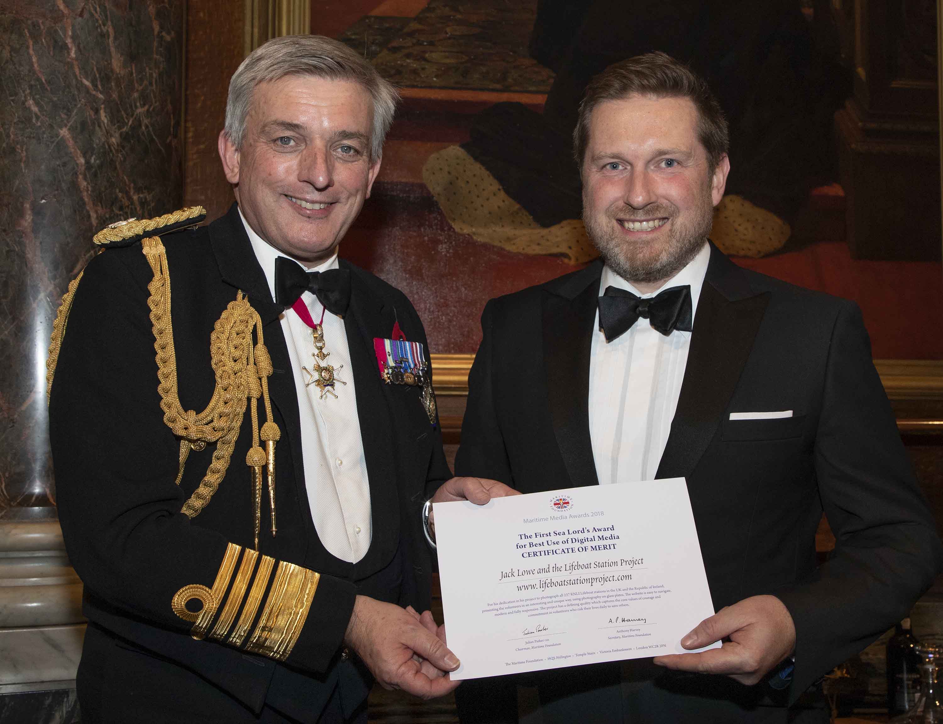 Jack Lowe receives his Certificate of Merit from Admiral Sir Philip Jones, First Sea Lord and Chief of Naval Staff.