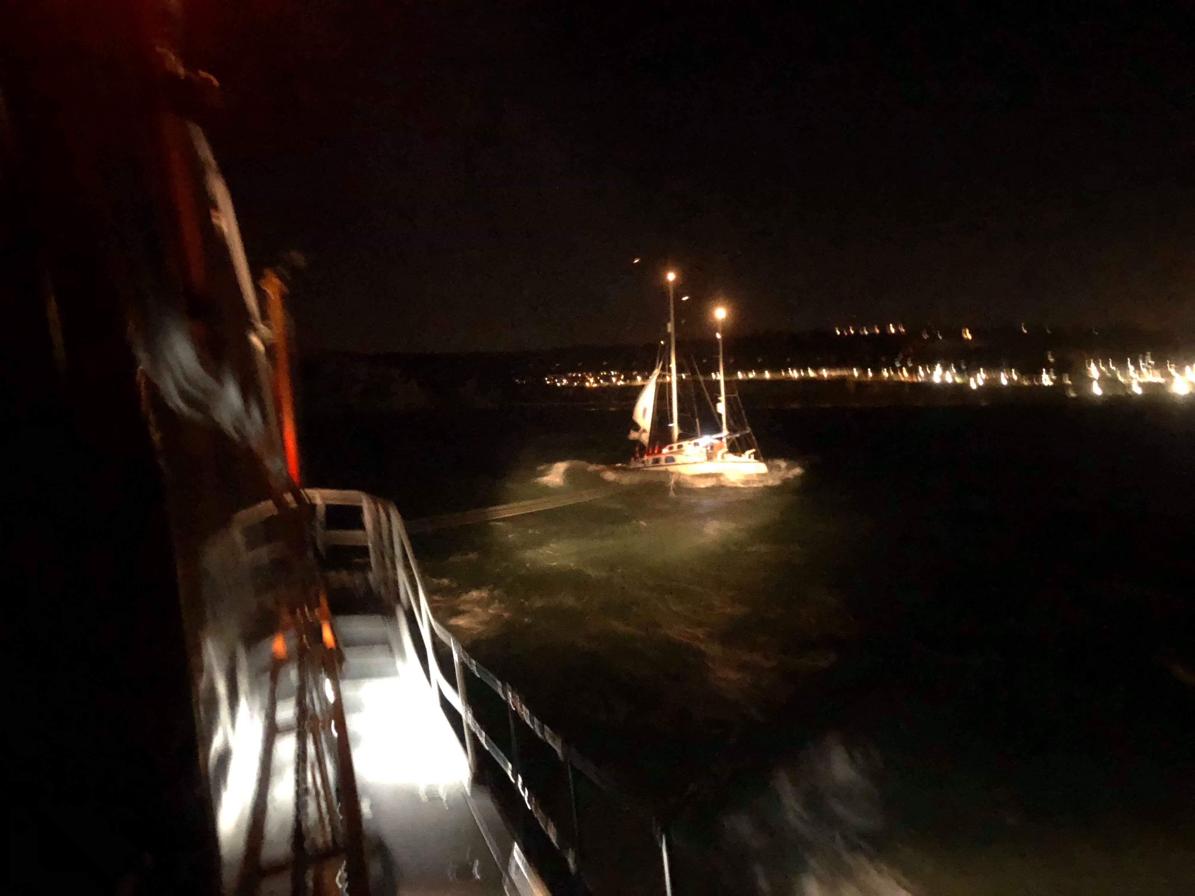 Dover lifeboat towing the catamaran back to shore