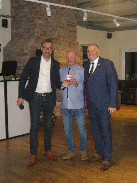 Ian Ellarby and Captain Dave Eccles presenting the 30-year service award to Steve Carroll.