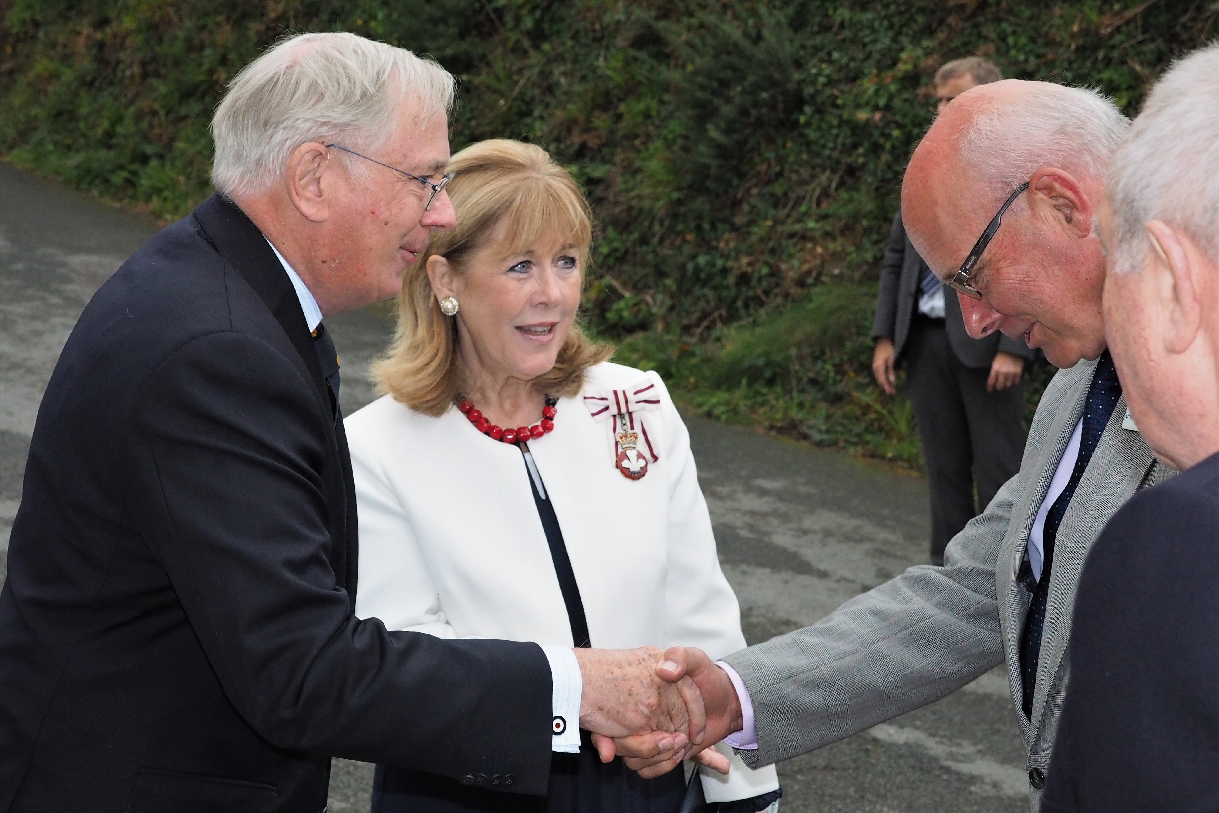 The Duke of Gloucester, accompanied by Lord Lieutenant of Dyed Sara Edwards, meets RNLI Council Member, Rear Admiral Mark Kerr at Angle lifeboat station.