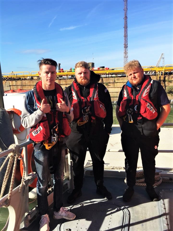 Logan pictured left with crew members Luke (centre) and Jason (right) four weeks after his accident on visit to the Sheerness RNLI lifeboat station to say a personal thank you.