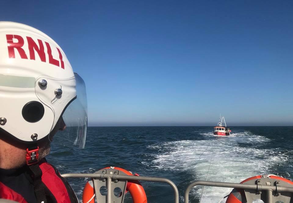 Tow being managed by RNLI crew member