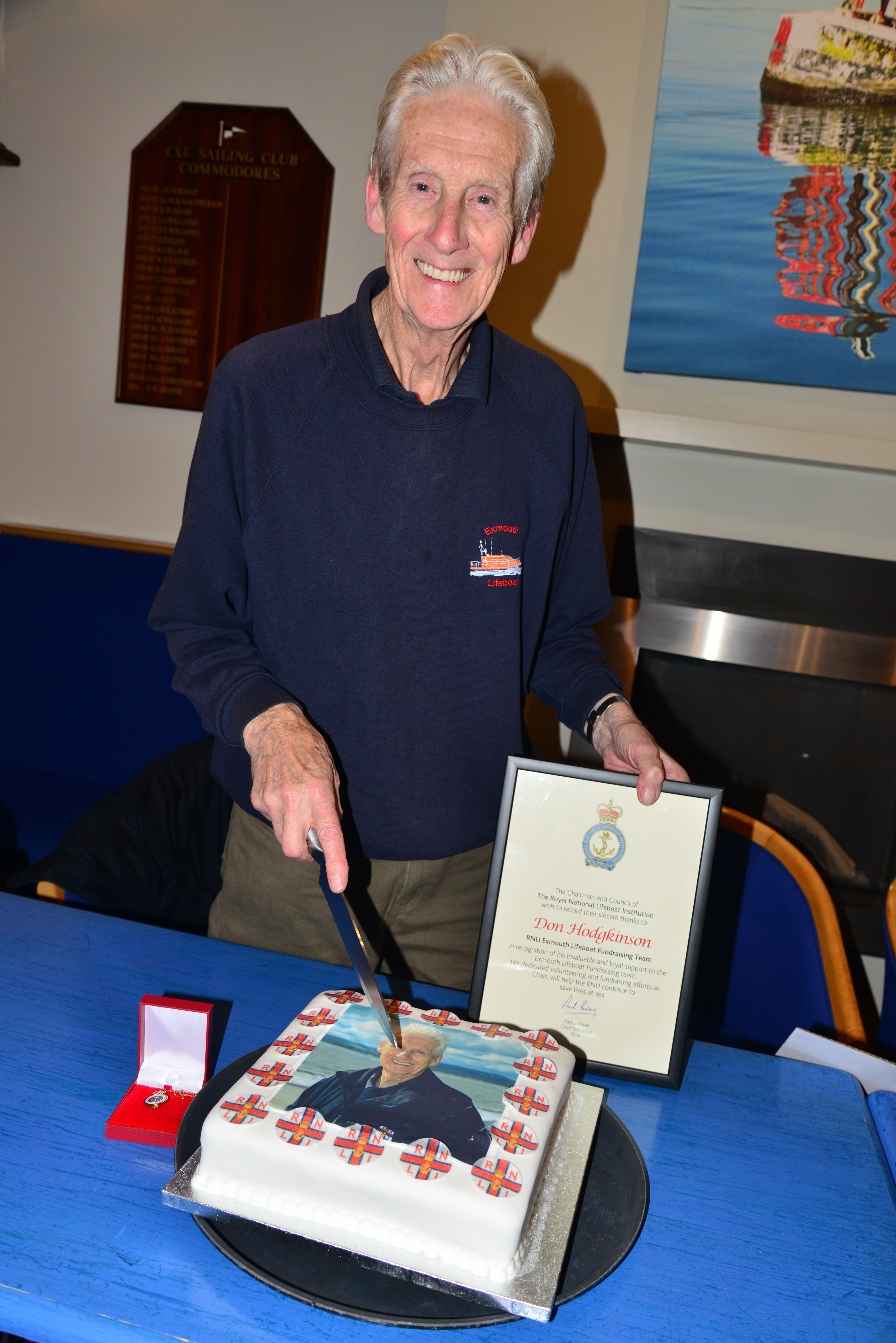 Former Fundraising Team Chair, Don Hodgkinson with his gold badge, certificate and a special cake