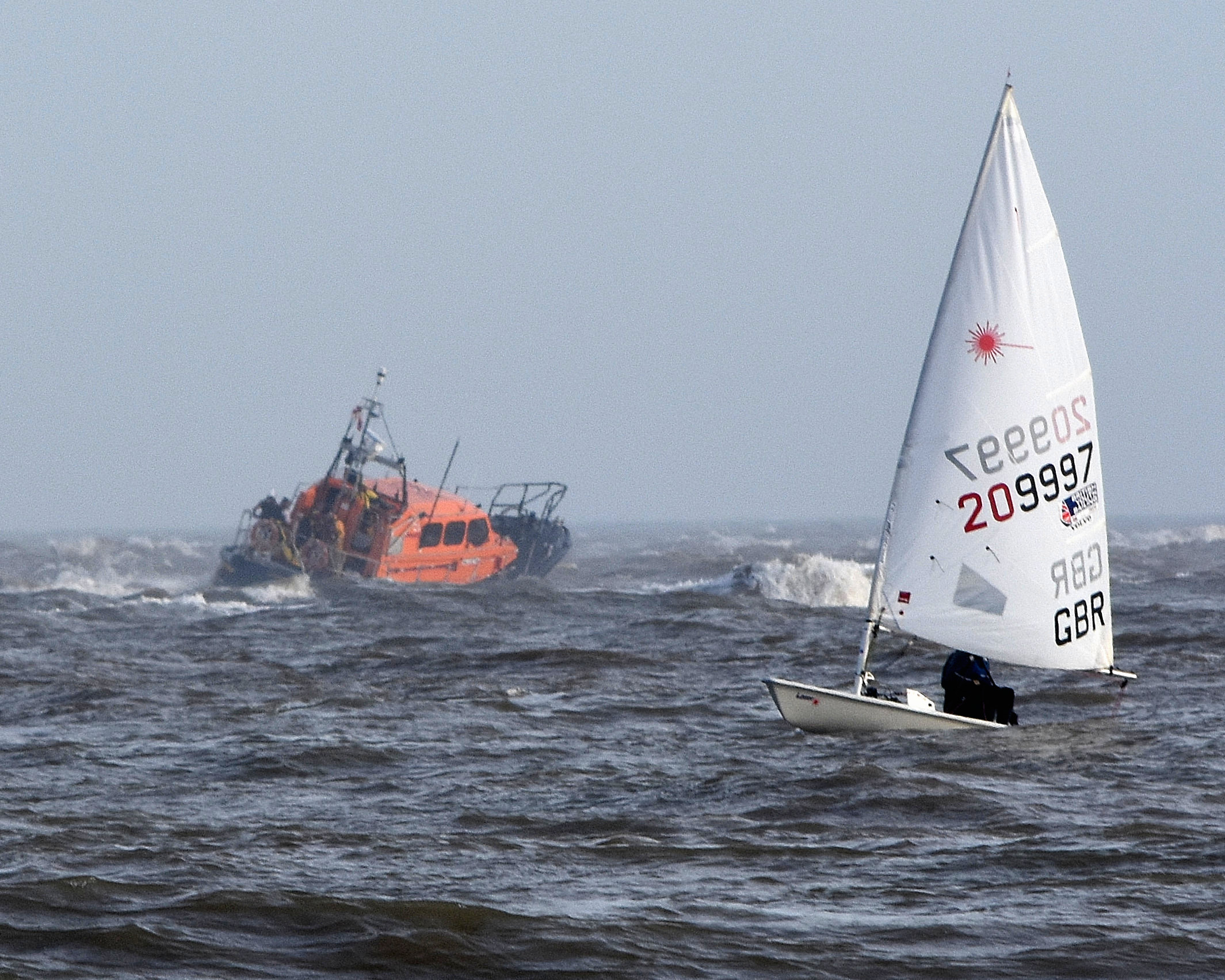 Lowestoft RNLI Lifeboat crosses the sandbank to reach the stranded safety boat