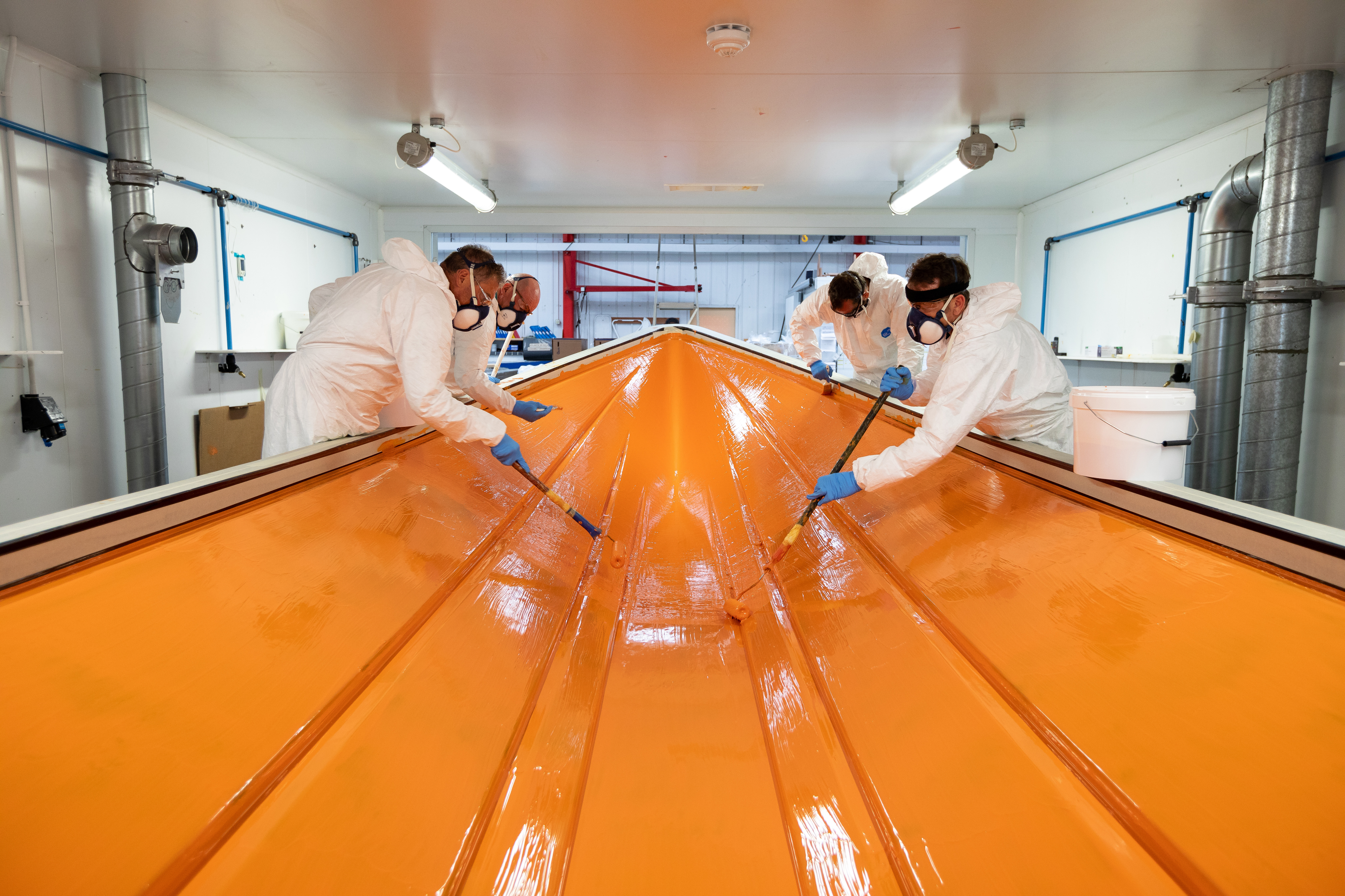An inshore lifeboat is gel coated orange