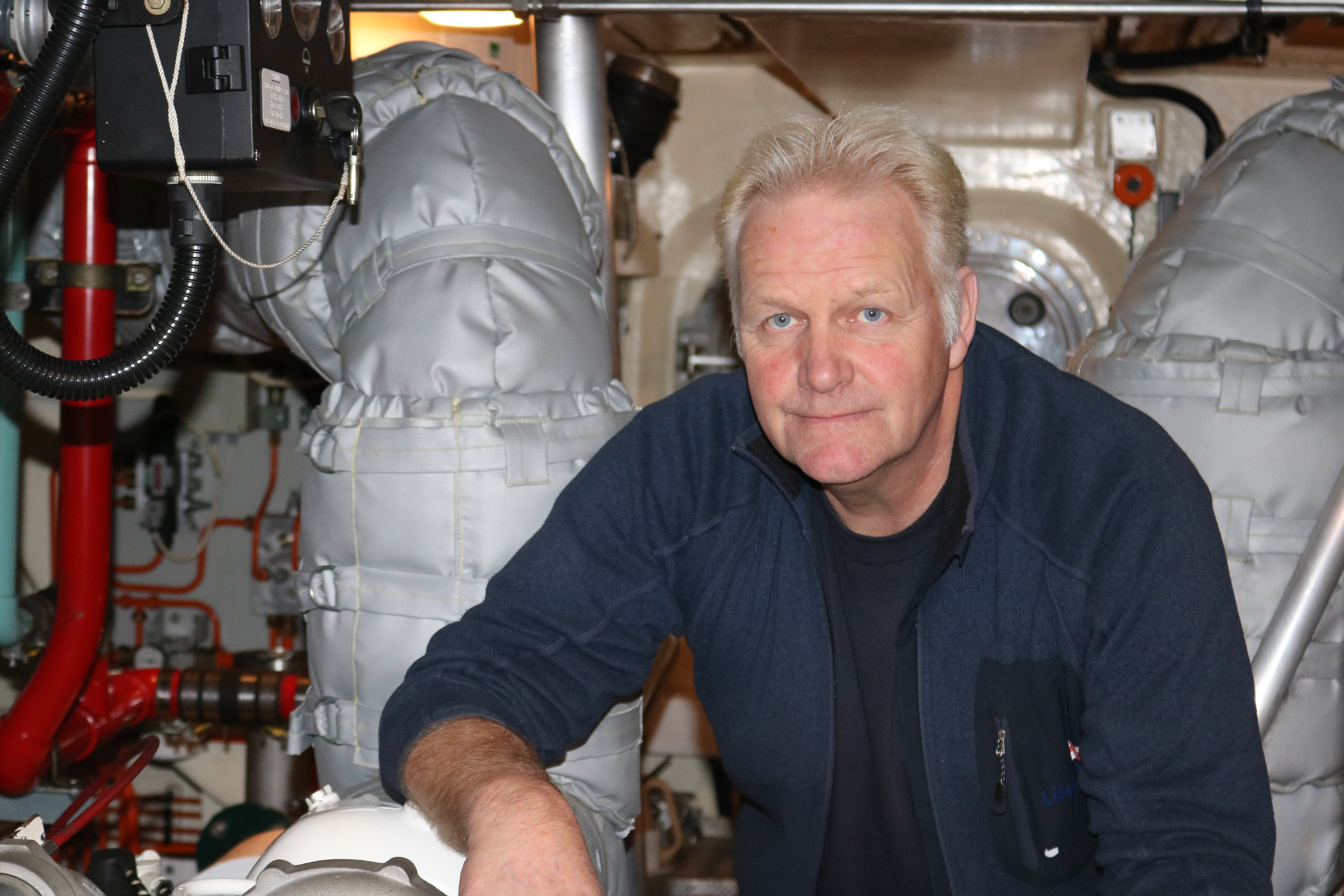 etiring mechanic Andrew Alston within the engine room of Trent class all-weather lifeboat