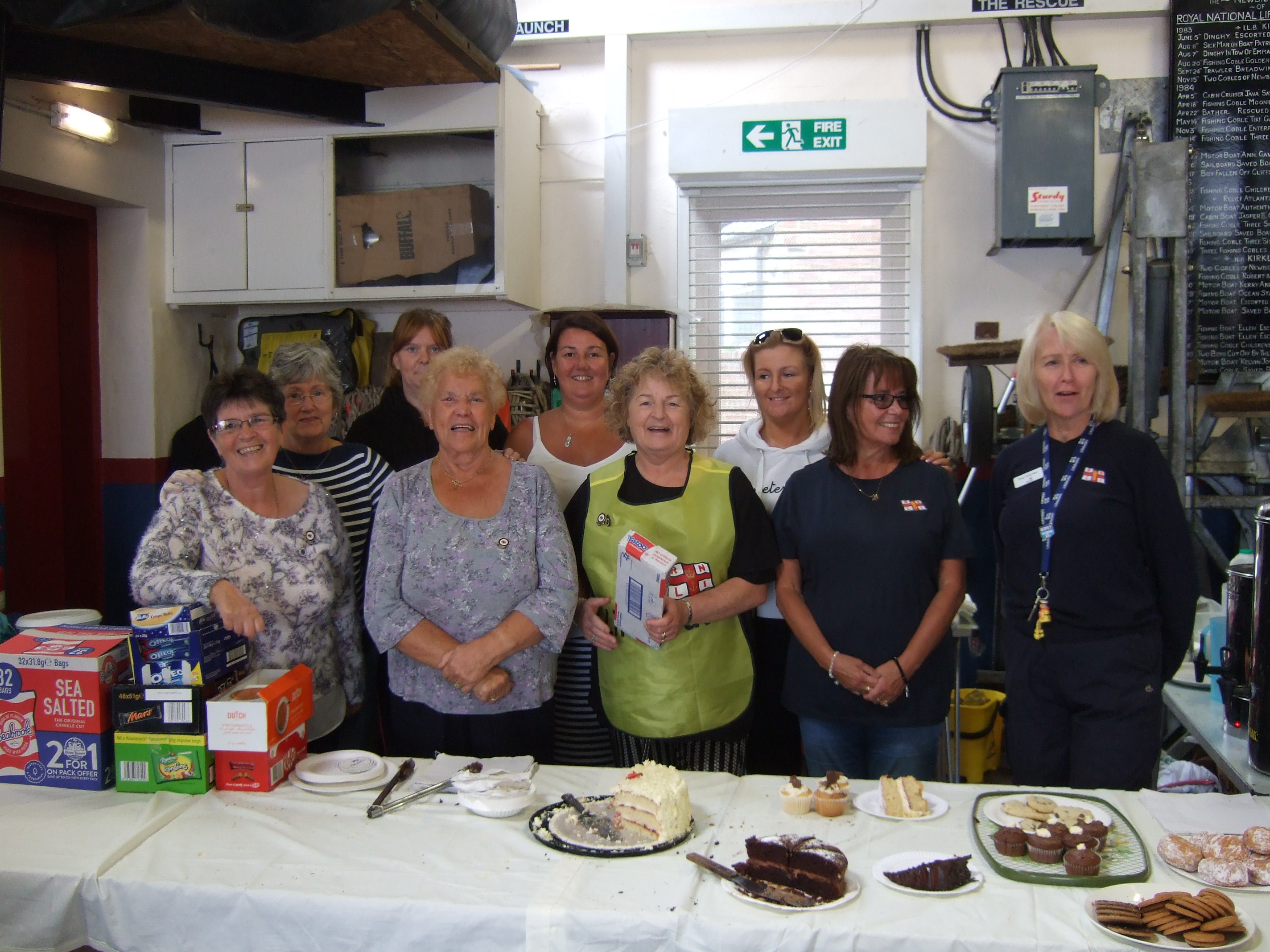 Some of the volunteer fundraisers gathered at the end of the event