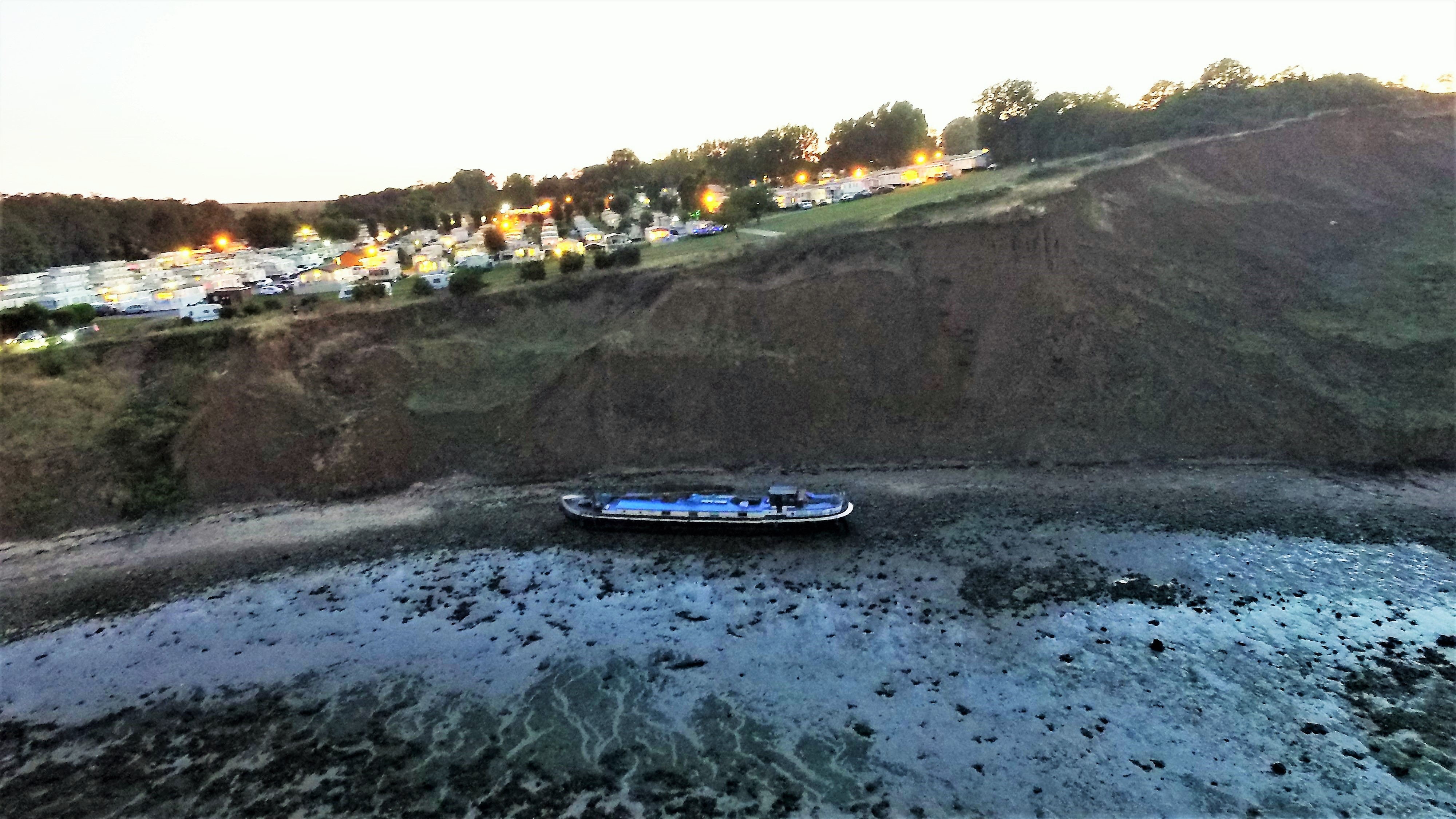 A different view of the grounded Dutch barge.