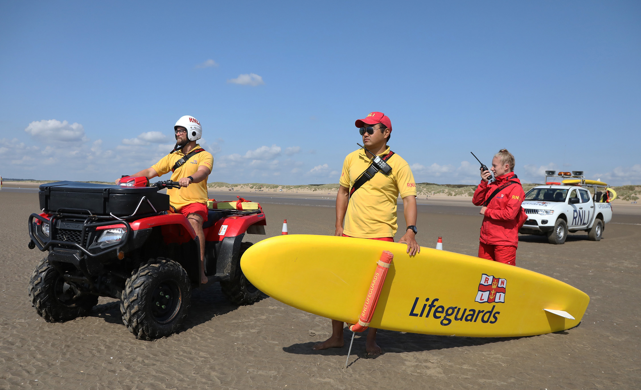 three lifeguards ready for action 