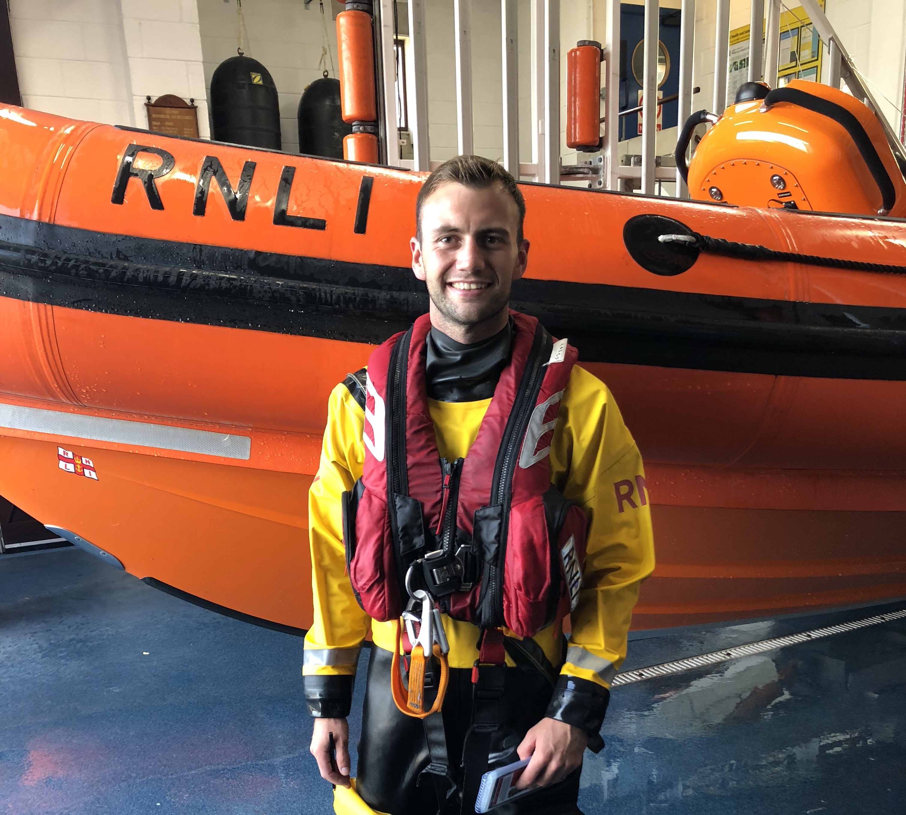 Image of Sam Williams in drysuit, following his helm passout assessment