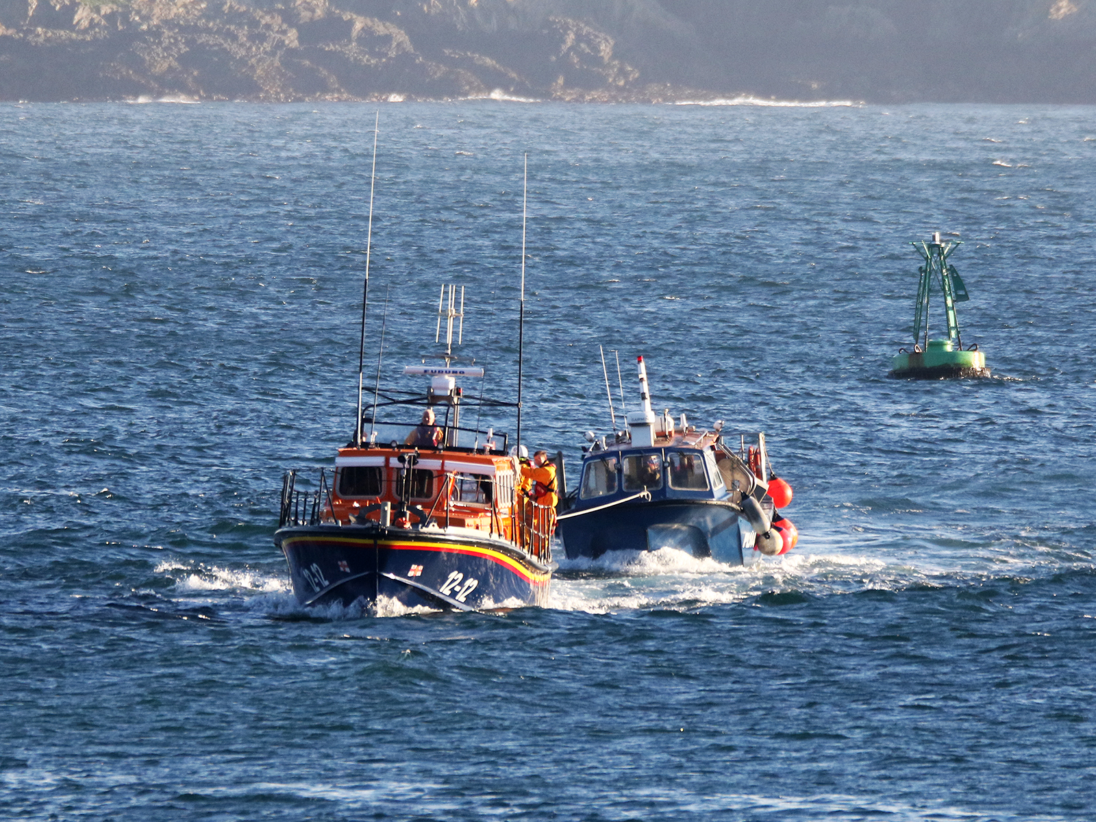 Douglas all-weather lifeboat Marine Engineer with casualty vessel under tow
