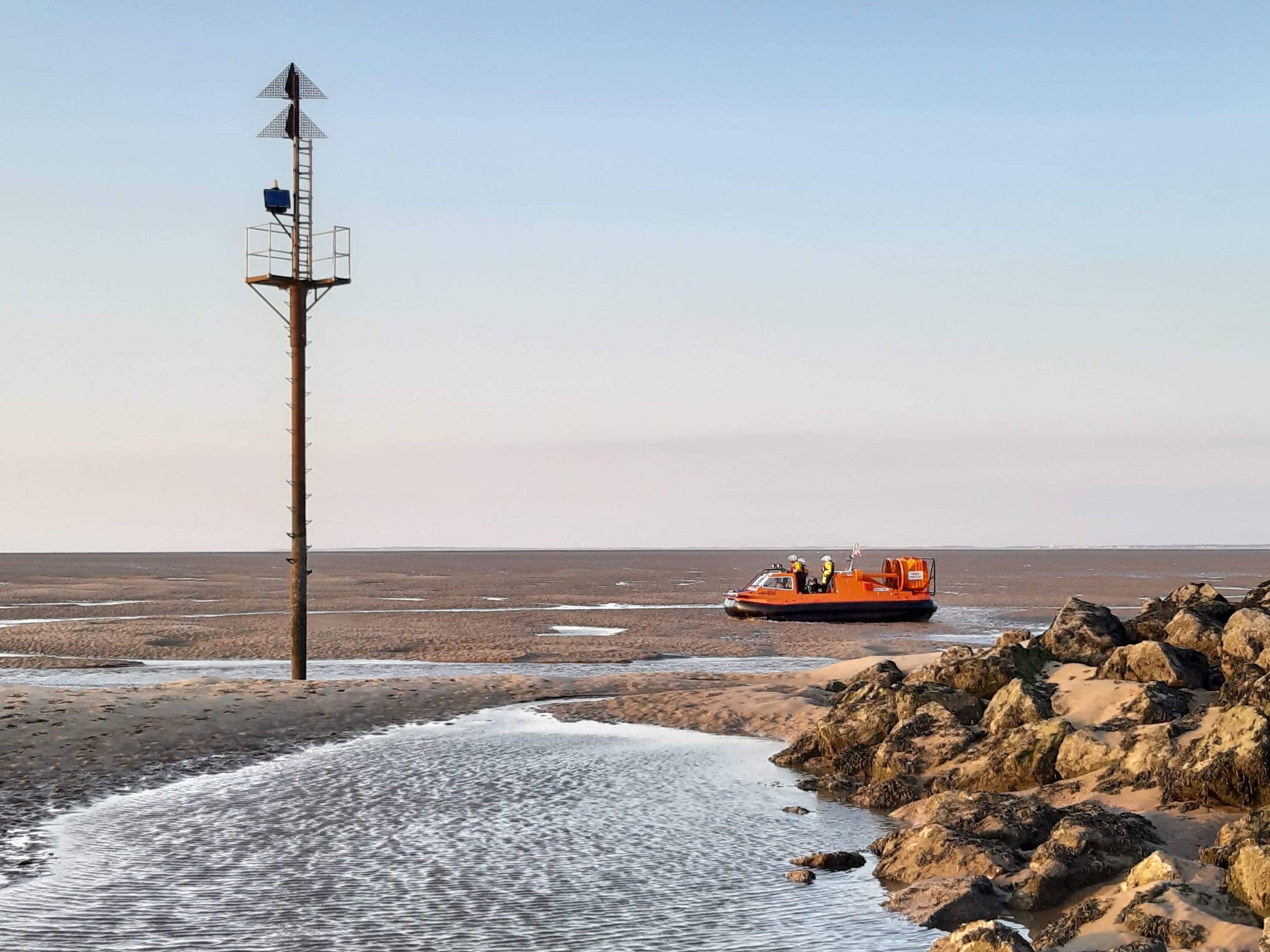 RNLI Hovercraft attends rescue of beached Porpoise off Meols, Wirral