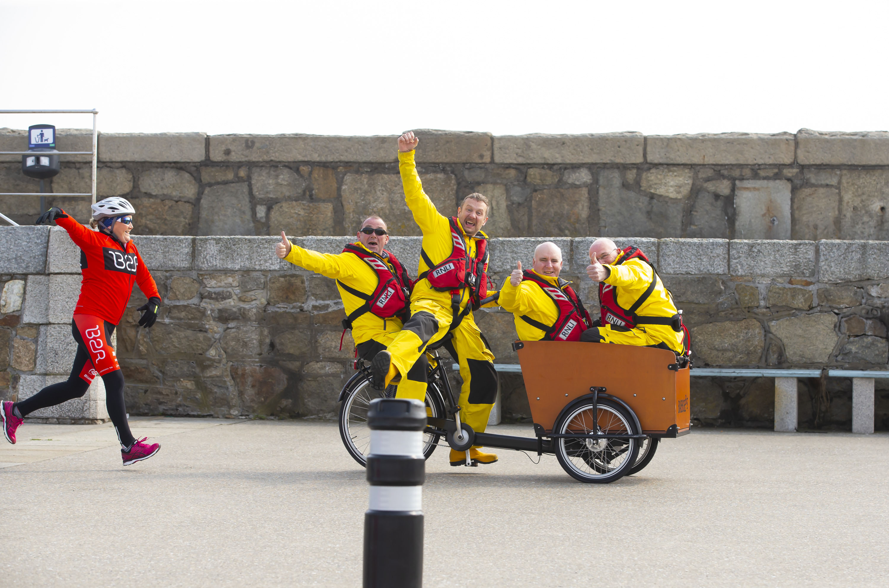 Fundraiser Mary Nolan Hickey chases after Dun Laoghaire RNLI during Mayday launch