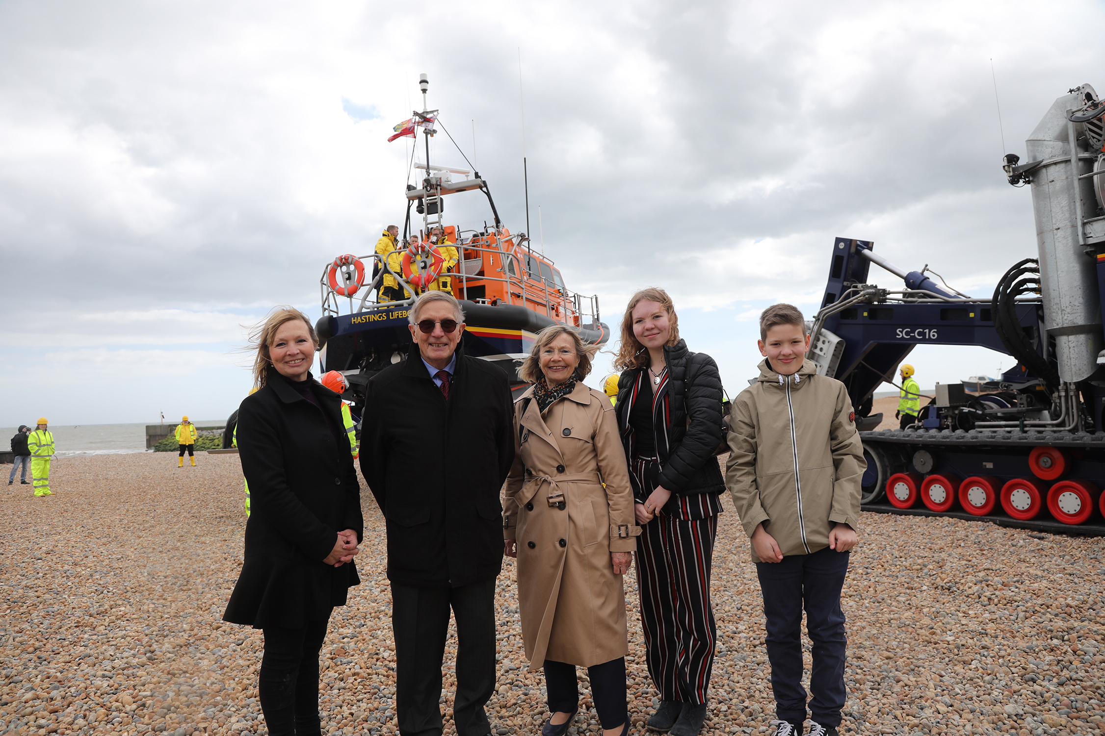 Relatives of Richard Colton pictured with the lifeboat and launch and recovery system.