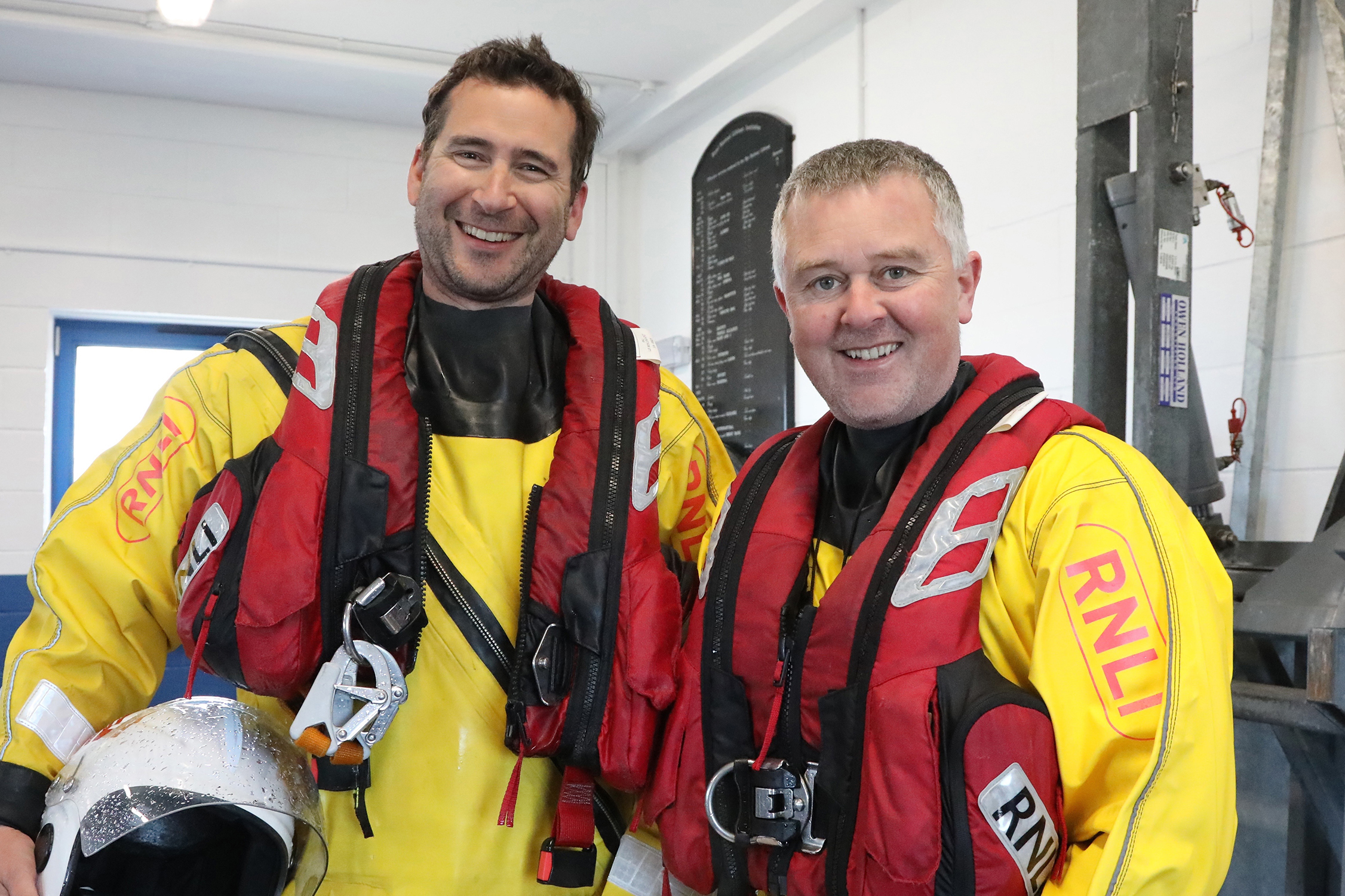 Tim Dickinson and Allen Head smile for the camera after Tim's successful passing out