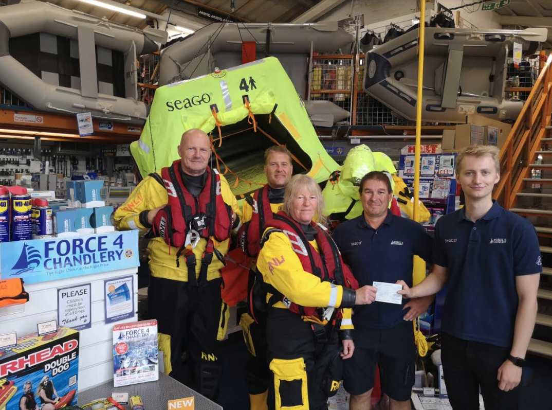 Lifeboat Operations Manager Diane Carrier and her crew accepted the cheque on behalf of the RNLI from Force 4’s Julian Cox and Jonny Dalmas.